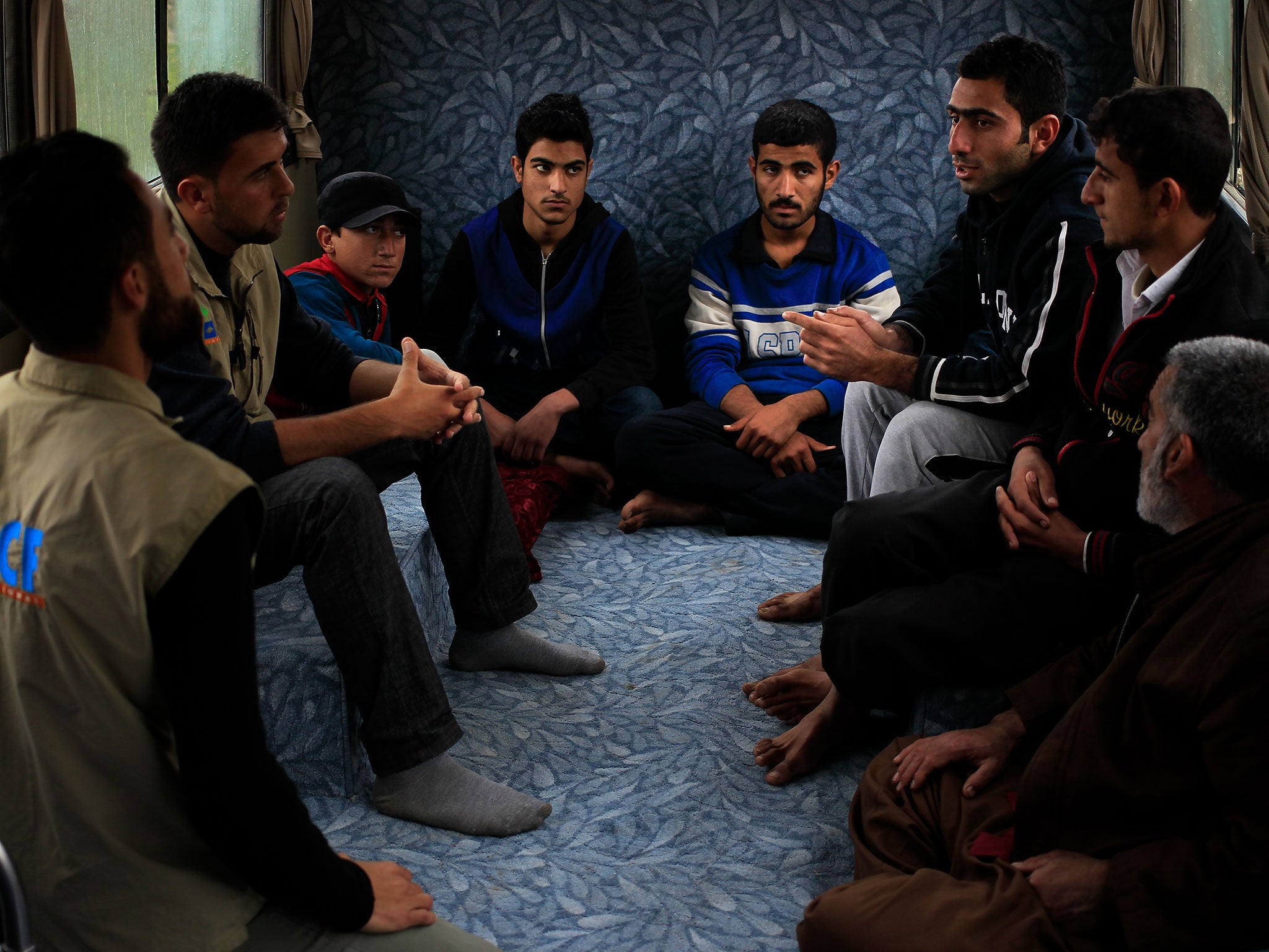 Residents with ACF aid workers in Tel Kaif, north of Mosul