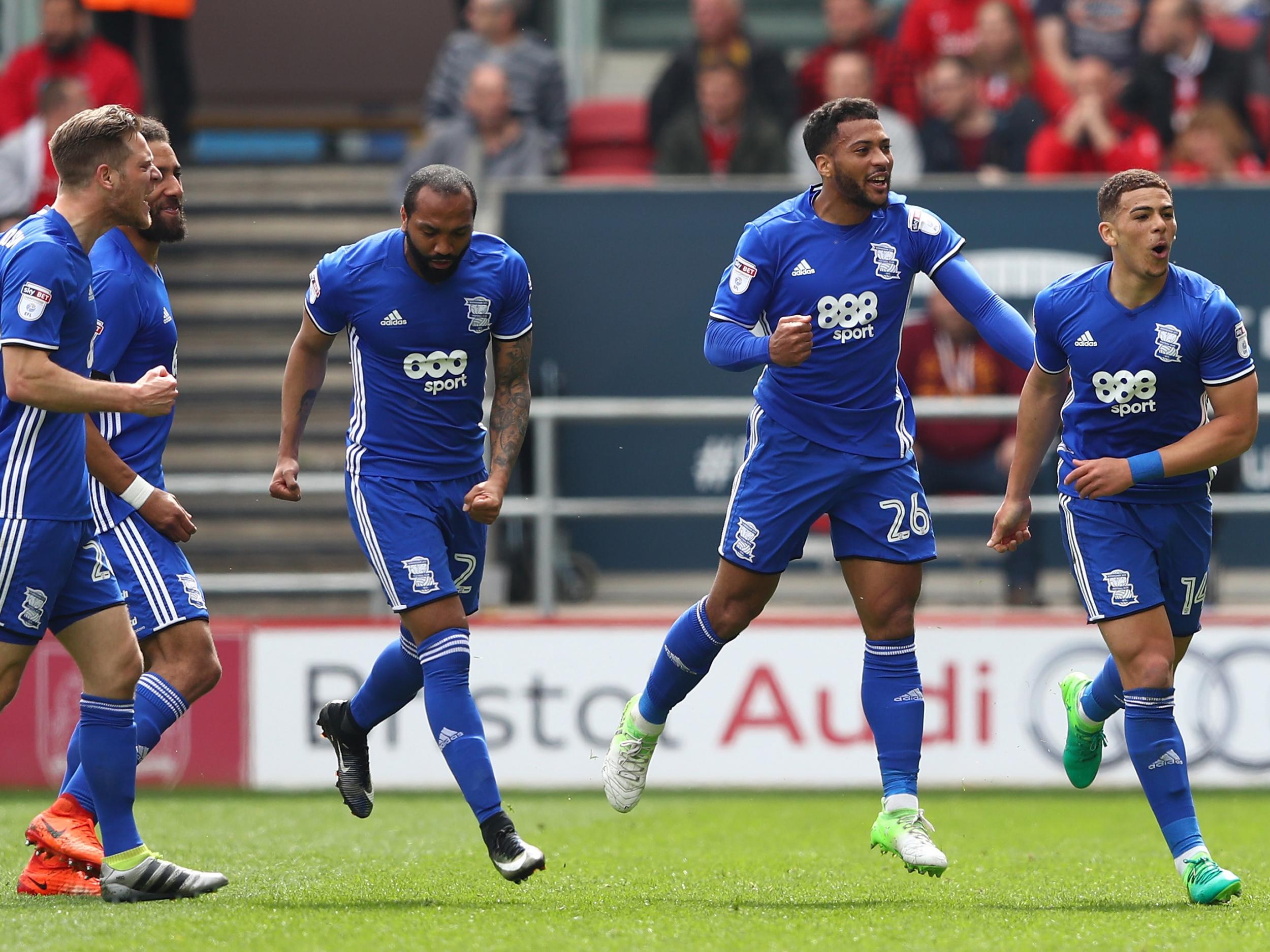 Che Adams is mobbed after scoring the only goal of the game