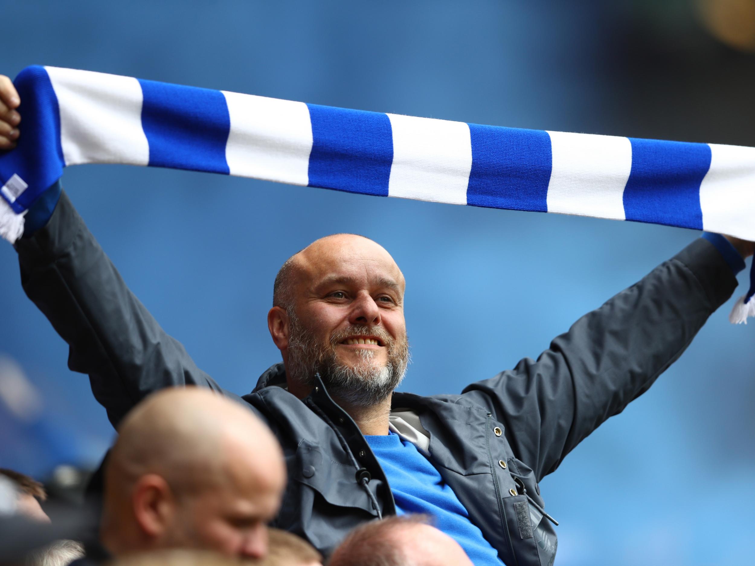 A Birmingham fan celebrates at the final whistle