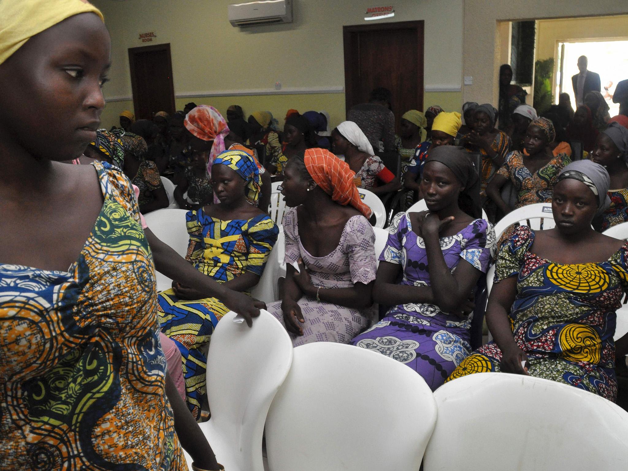 Some of the recently-freed girls wait in Abuja, the Nigerian capital