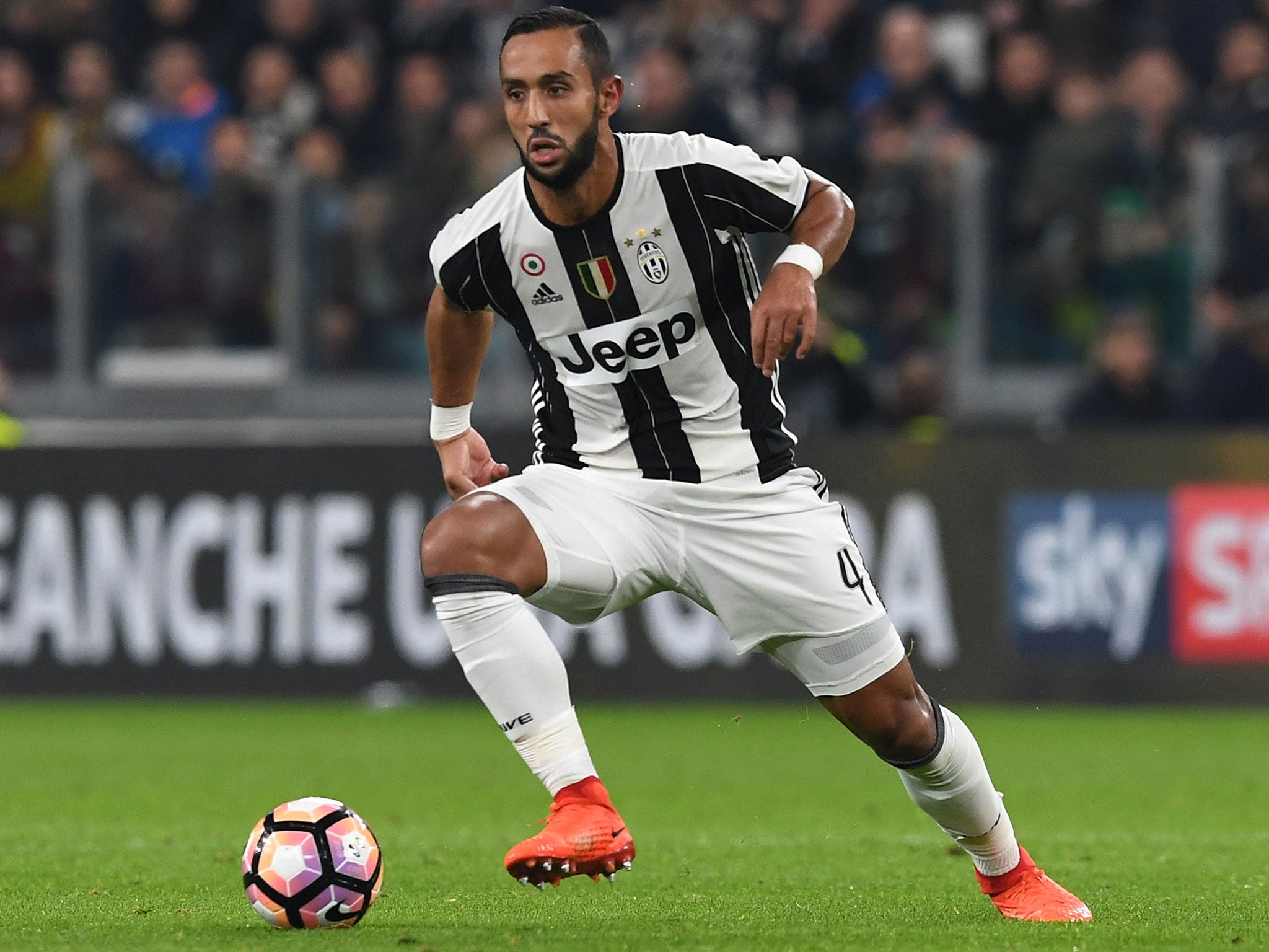 Juventus defender Mehdi Benatia was racially abused during a live TV interview in Italy