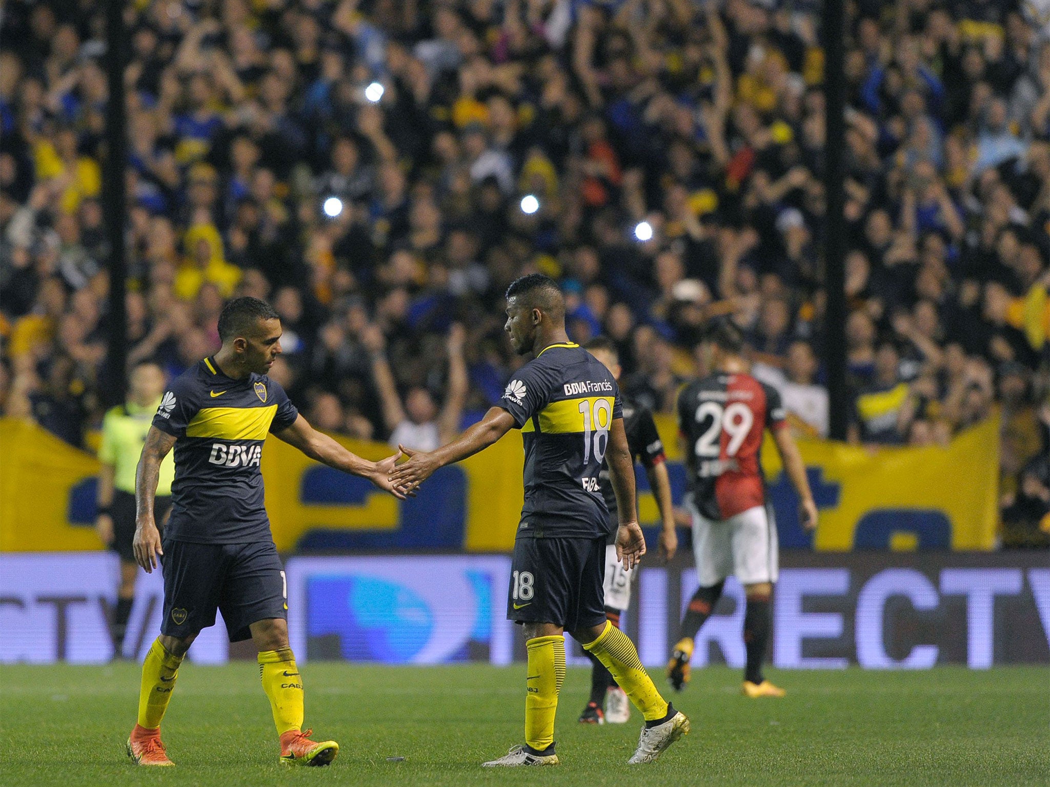 Frank Fabra (r) was this week subjected to racial abuse while playing for Boca