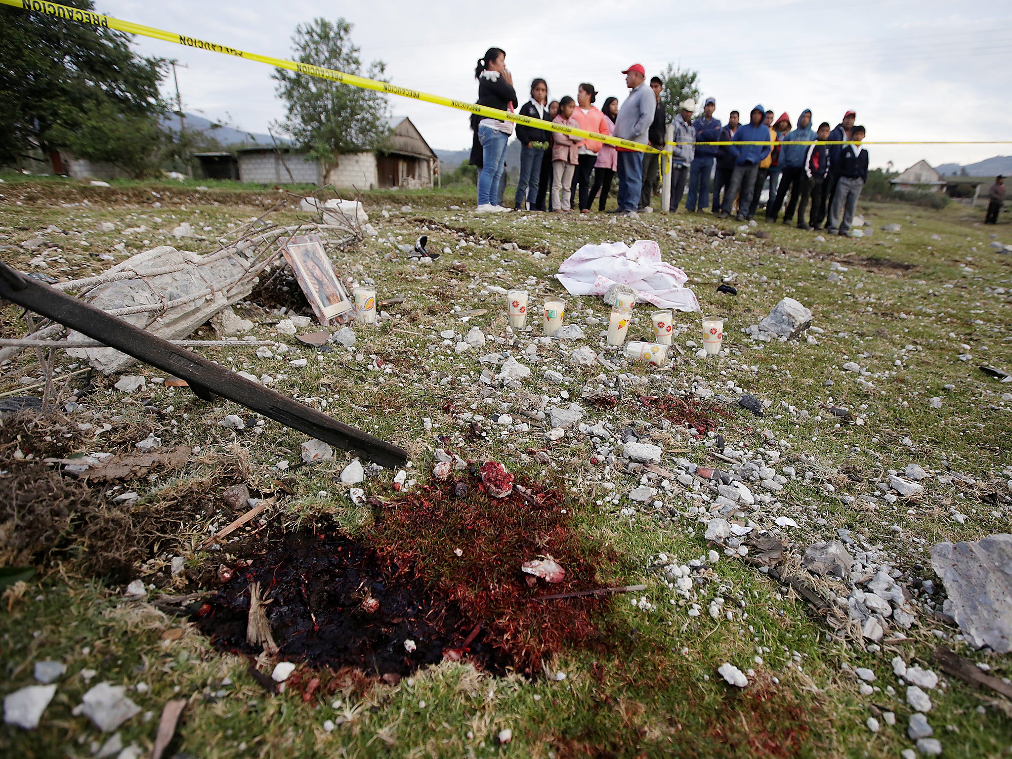 A blood stain is seen at the site of the explosion of a house where fireworks were stored in the town of San Isidro, Chilchotla