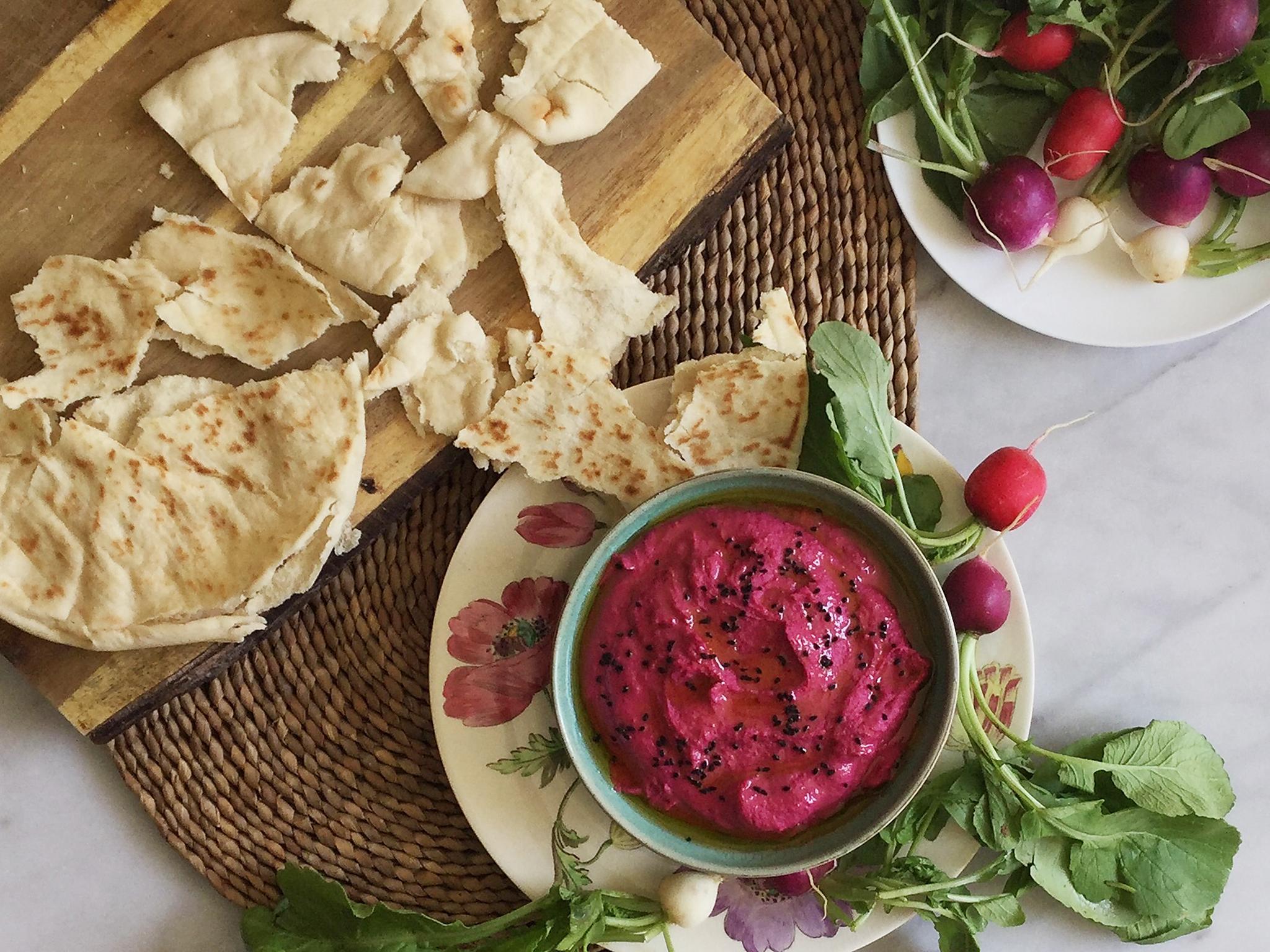 It takes minutes to make, and if pink's not your colour then simply leave out the beetroot. Serve with pitta and crunchy crudités, such as radishes