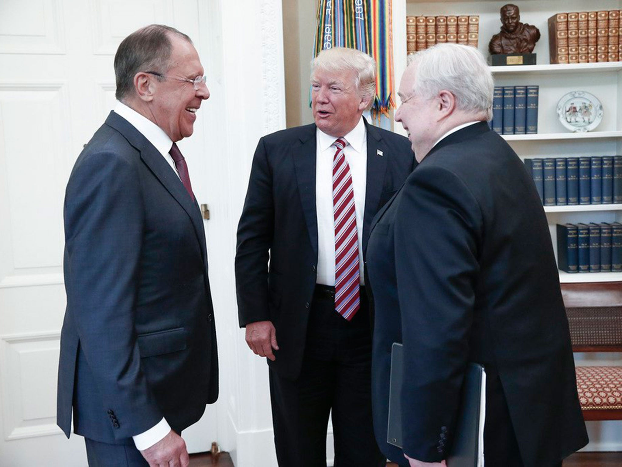 A Russian foreign ministry photo showing Donald Trump with Sergey Lavrov and Russian Ambassador Sergey Kislyak during their meeting in the White House on 10 May