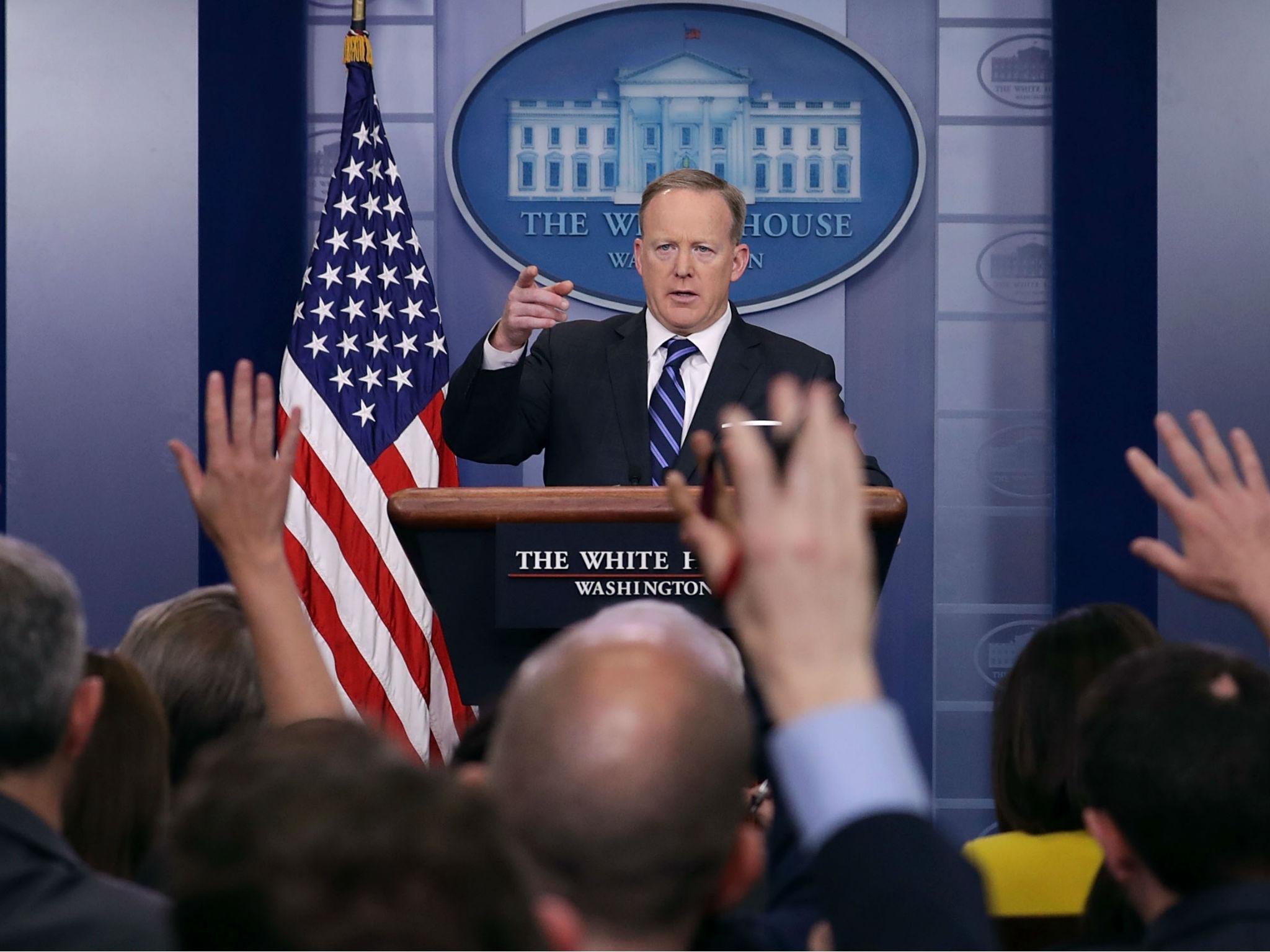 White House Press Secretary Sean Spicer calls on reporters during the daily news conference in the Brady Press Briefing Room at the White House April 10, 2017