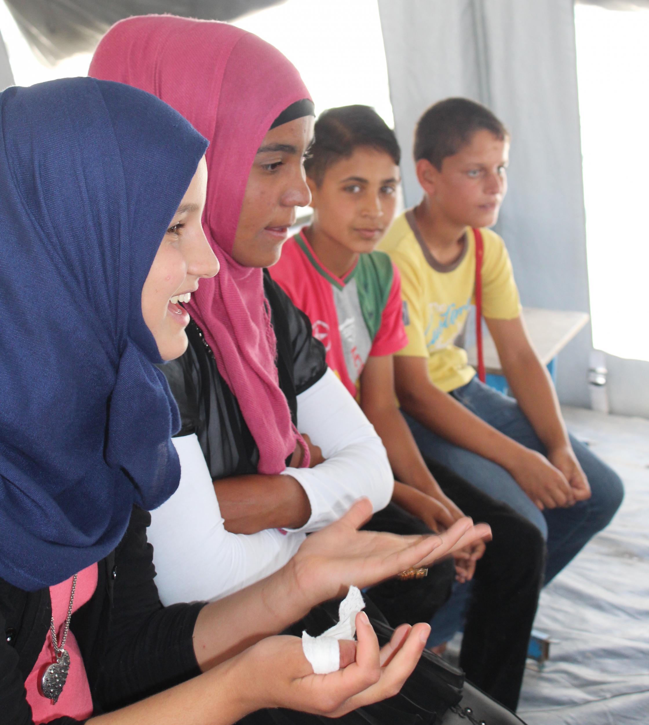 13-year-old Zahra (left) is determined to become a doctor when she grows up