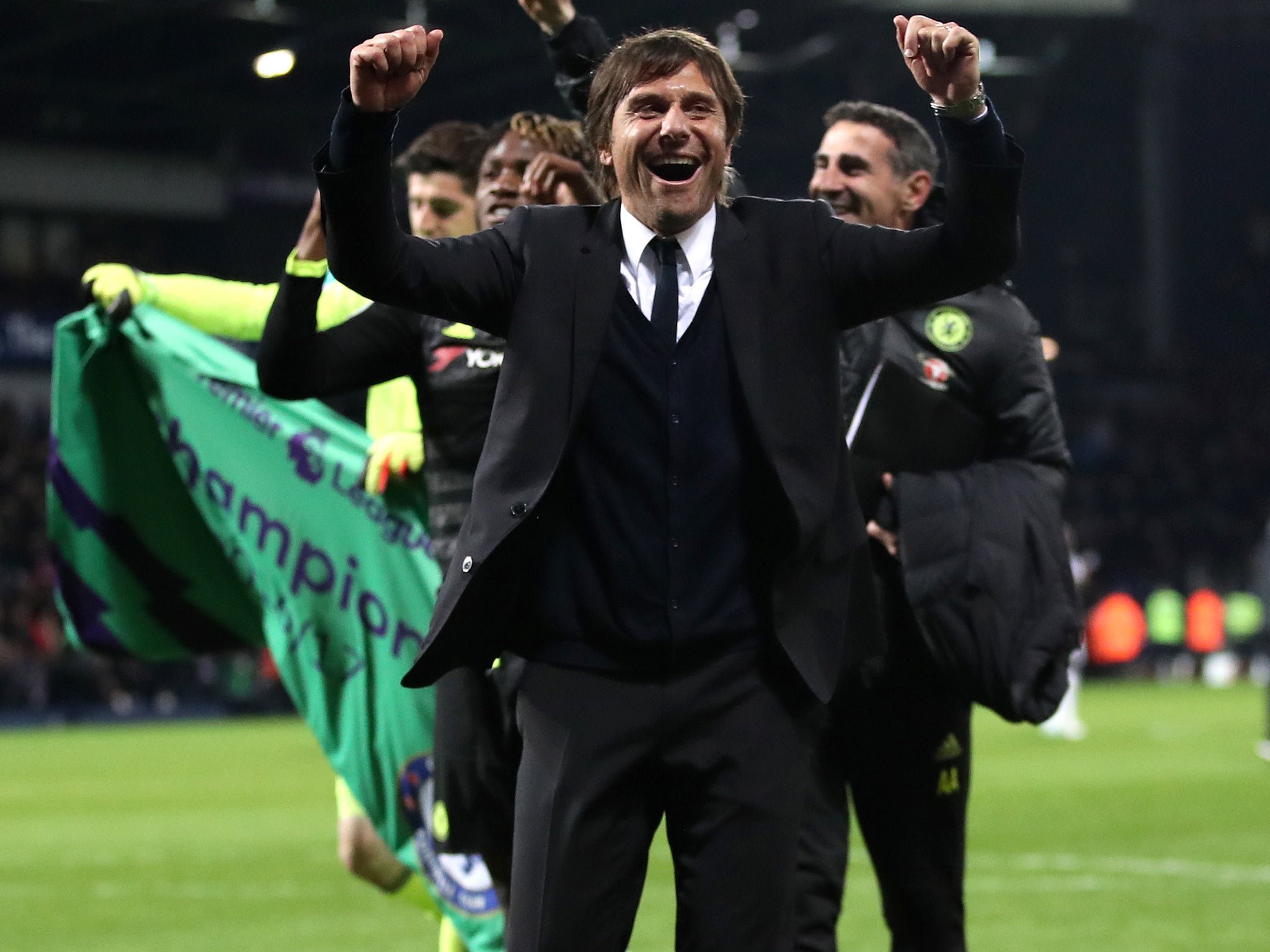 &#13;
Conti celebrated winning the Premier League title with his players &#13;