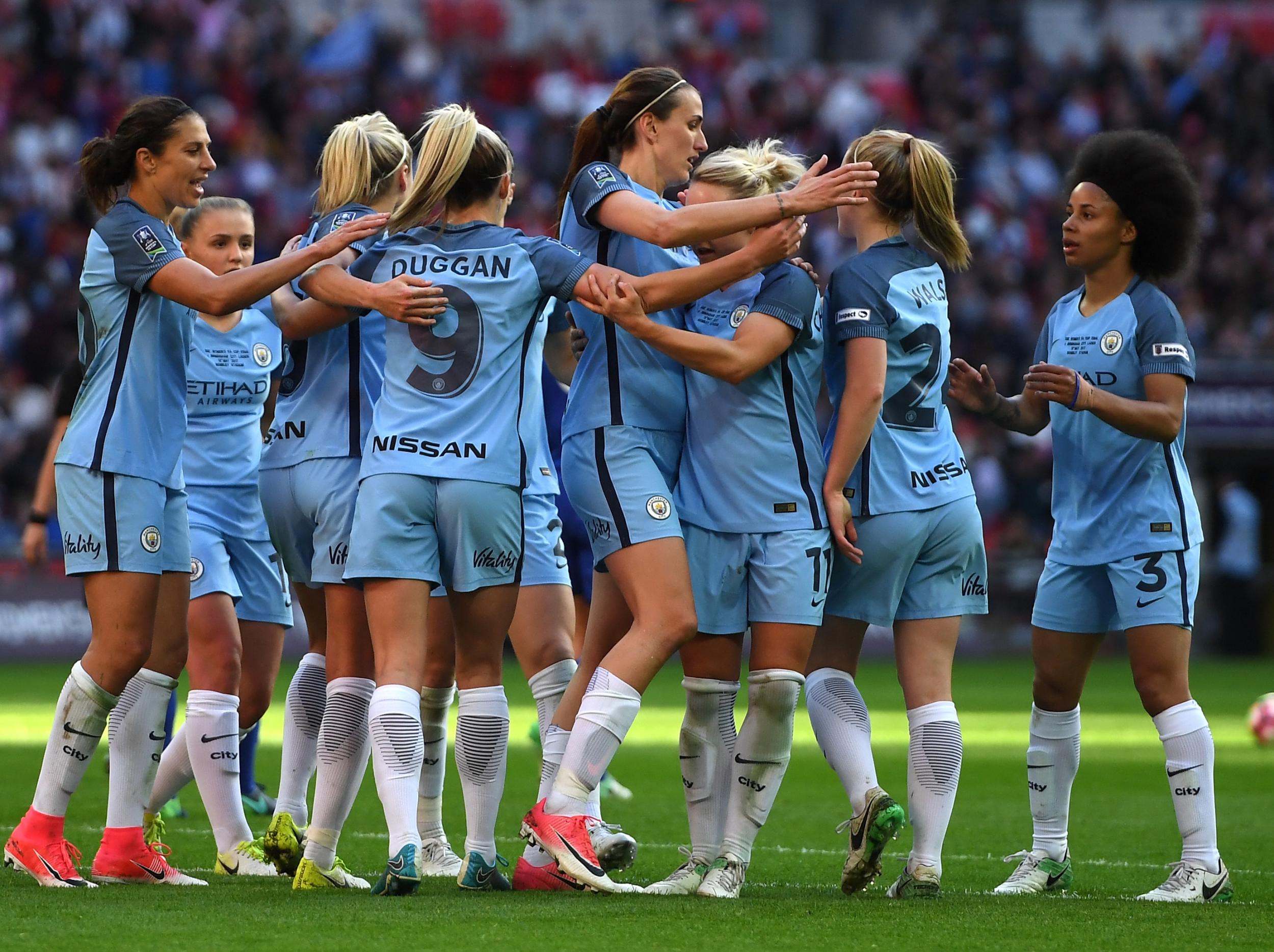 Manchester City celebrate winning the FA Cup upon the final whistle