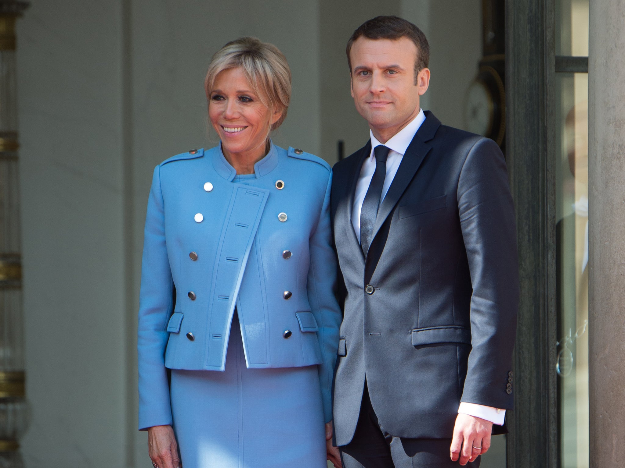 The lavender blue suit worn by Brigitte Macron is understood to have been on loan from Vuitton