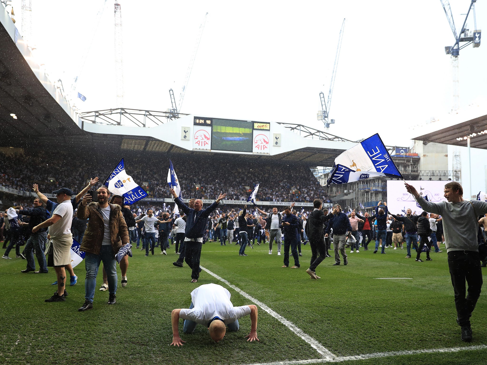 Fans flocked onto the pitch after the final whistle