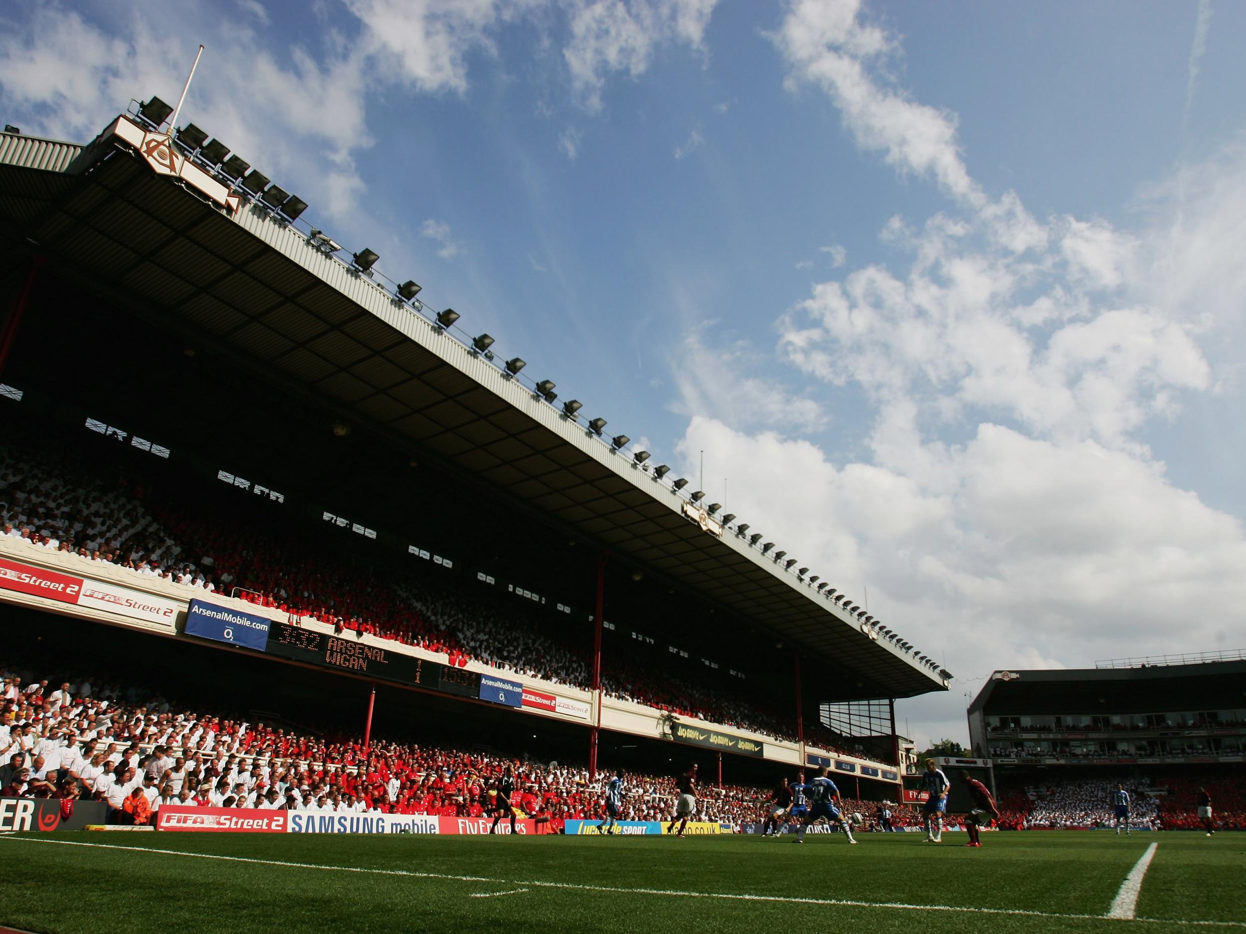 Fans watch on during the final match at Highbury