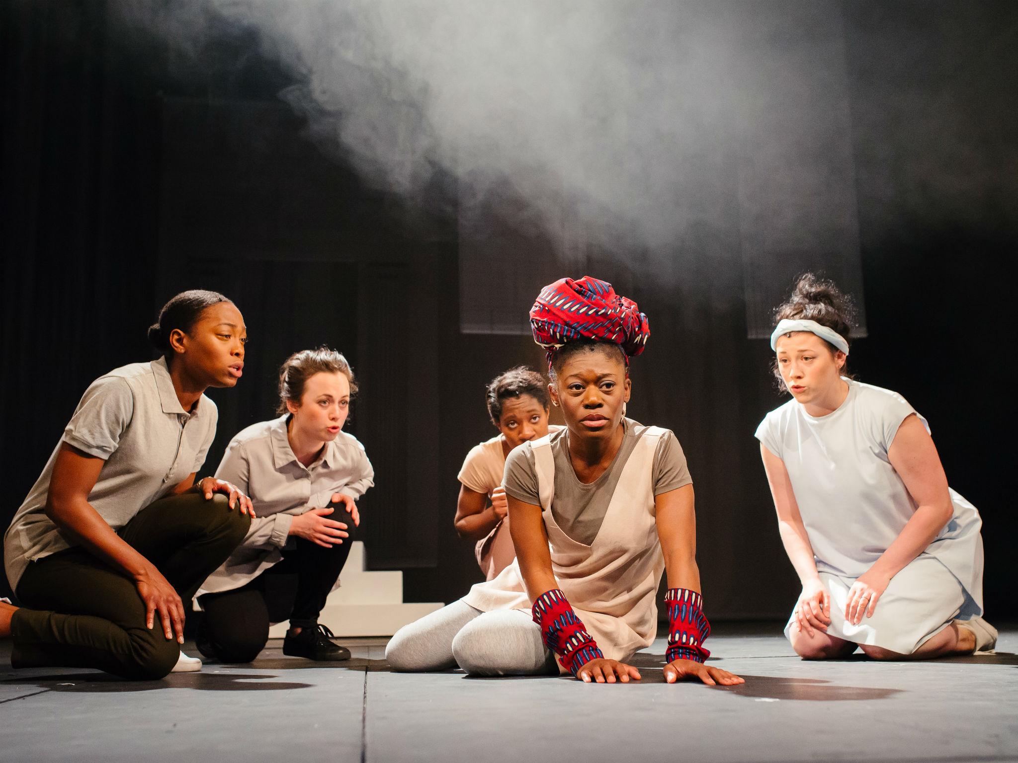 Akiya Henry (centre) as Maddy-Medea with full chorus in the all-female cast of 'Medea' at Bristol Old Vic