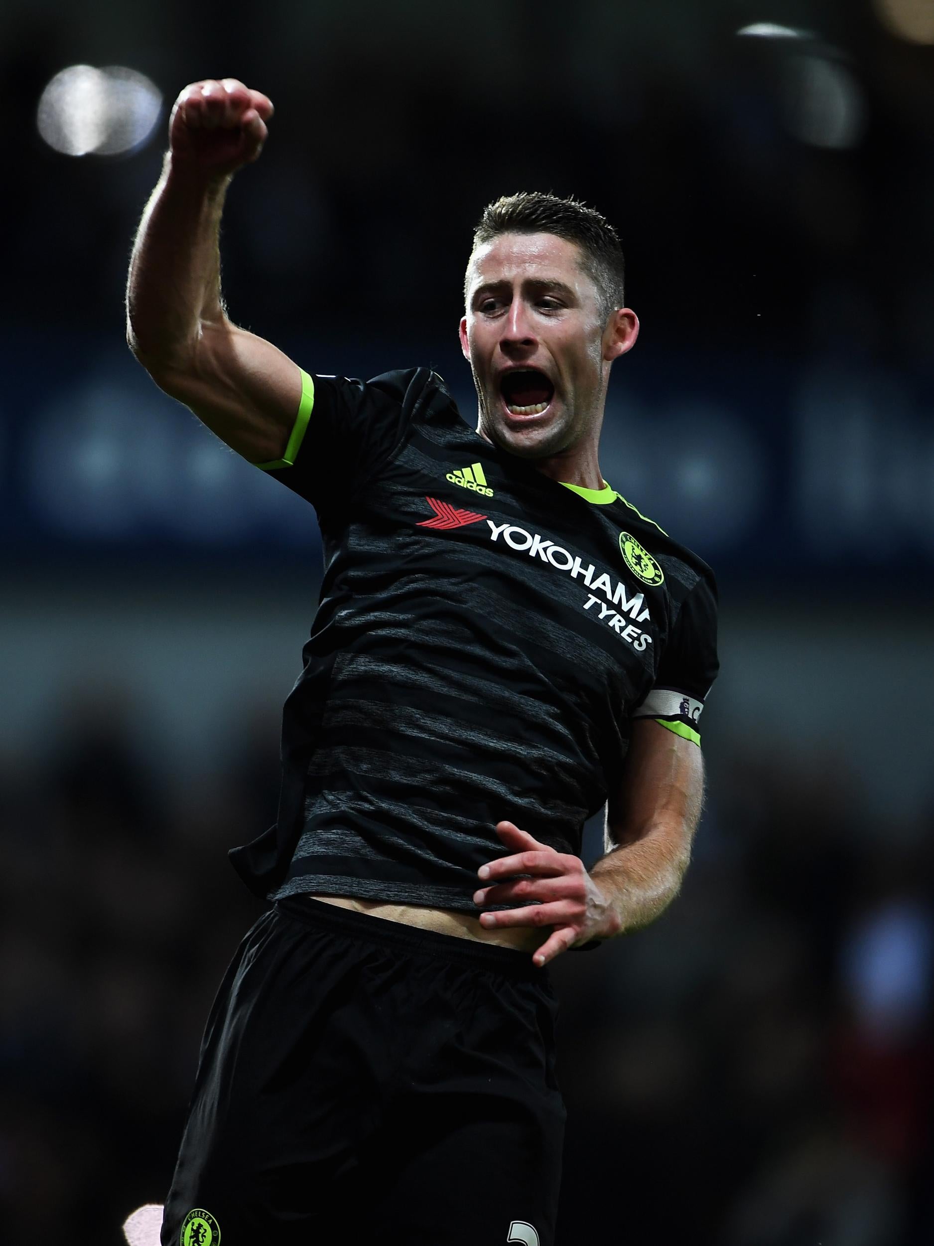 Cahill celebrating Chelsea's title success at the Hawthorns