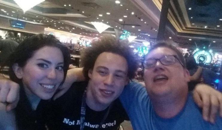 Marcus Hutchins (centre) with friends at a cyber security conference