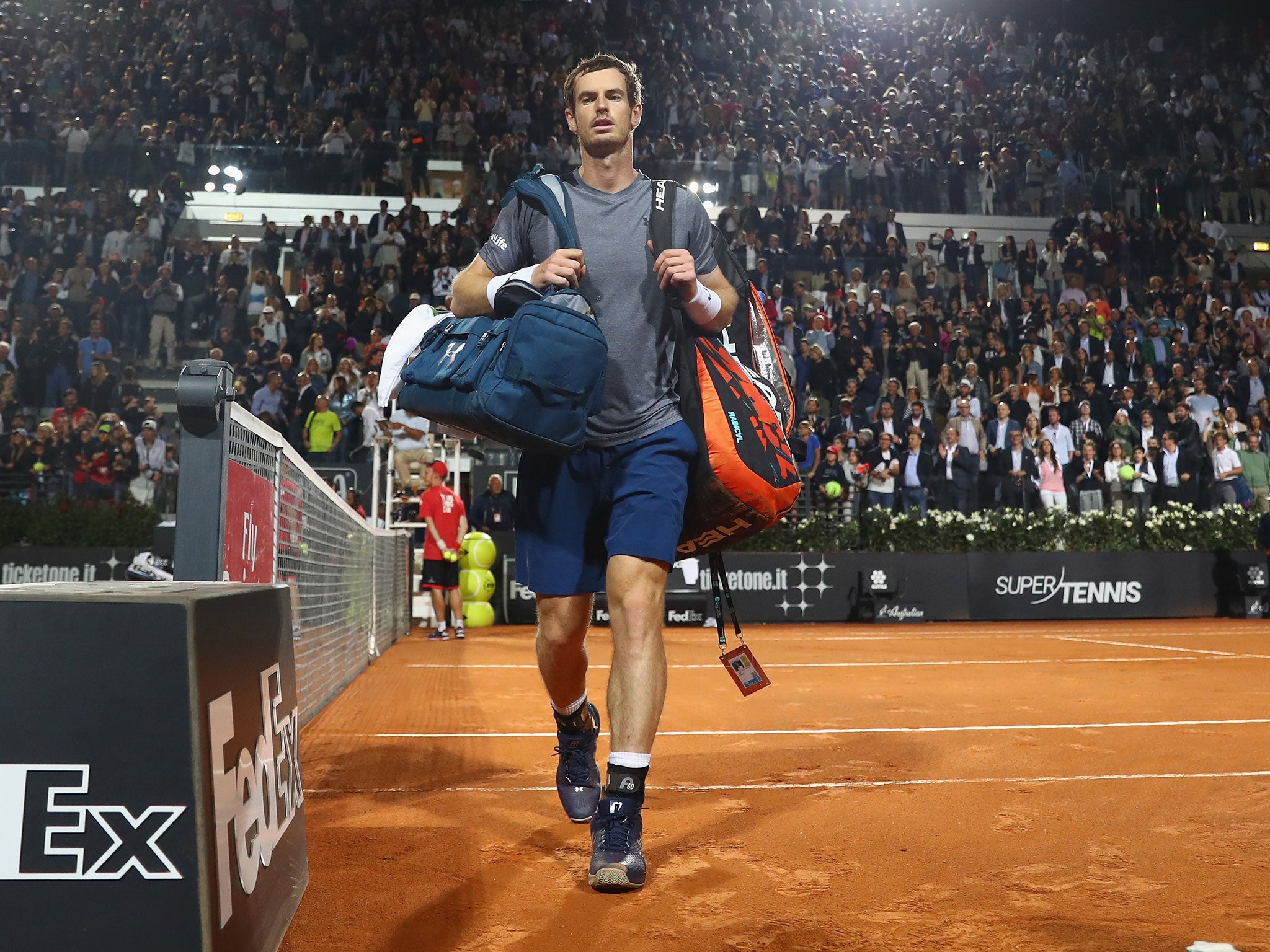 Andy Murray suffered a second round exit at the Italian Open after losing to Fabio Fognini