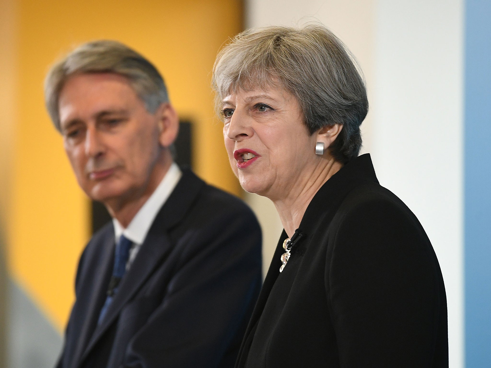 Prime Minister Theresa May and Chancellor Philip Hammond during a general election campaign event in East London