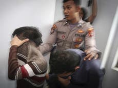 Sharia court in Indonesia sentences two gay men to 85 lashes each after being caught having sex