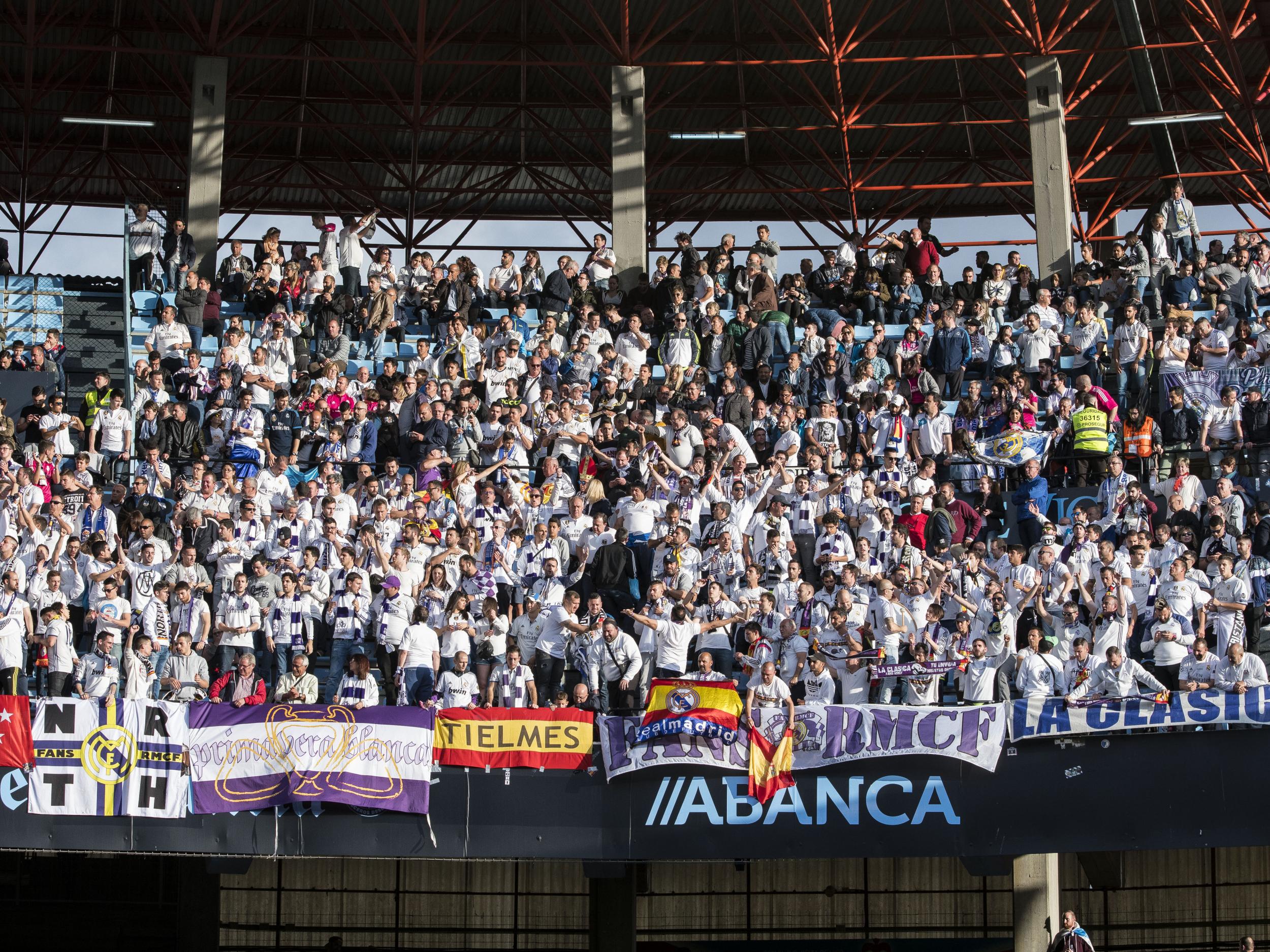 Madrid fans cheering on their team at the Balaídos