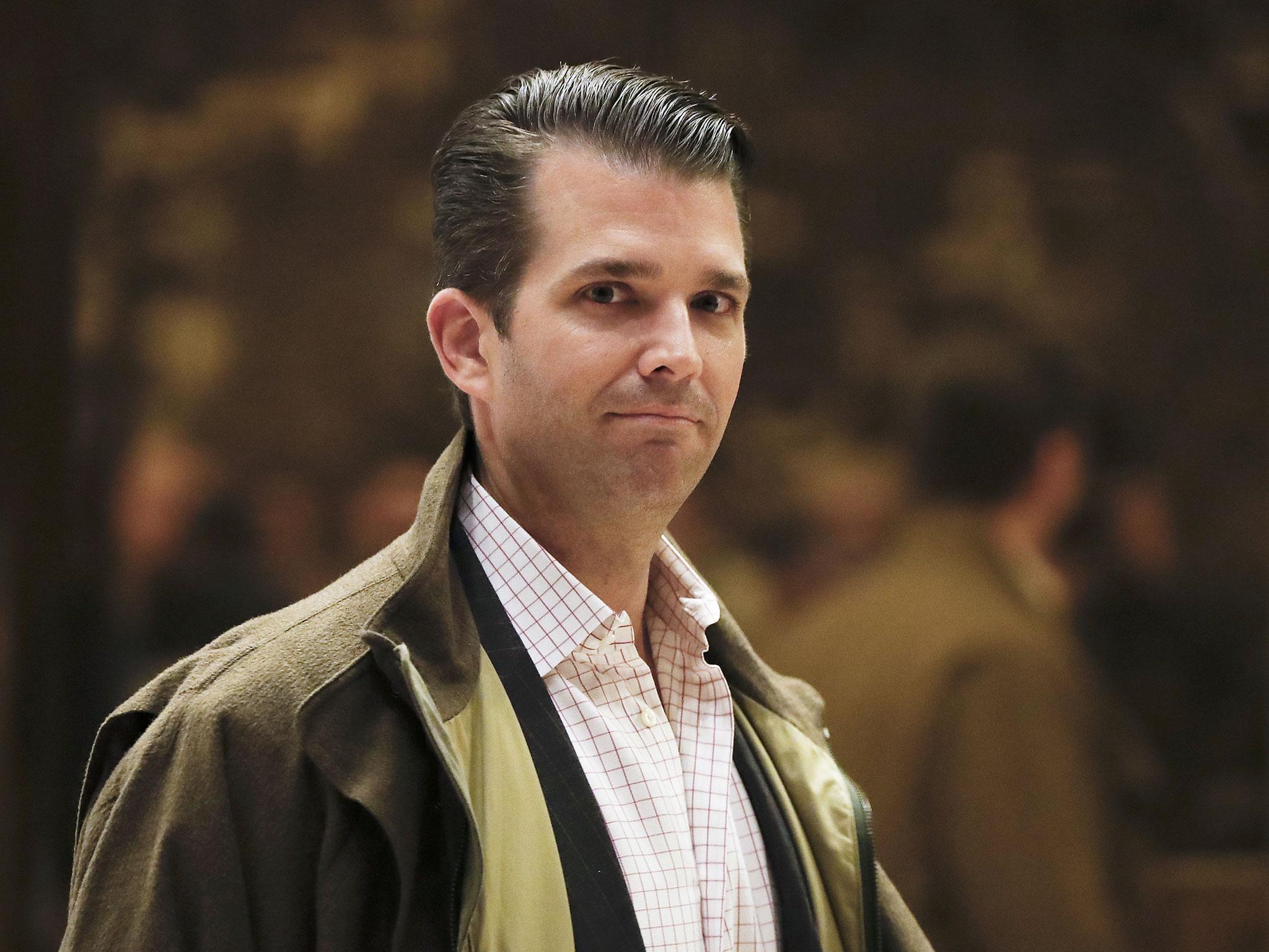 Donald Trump Jr exits a meeting at Trump Tower