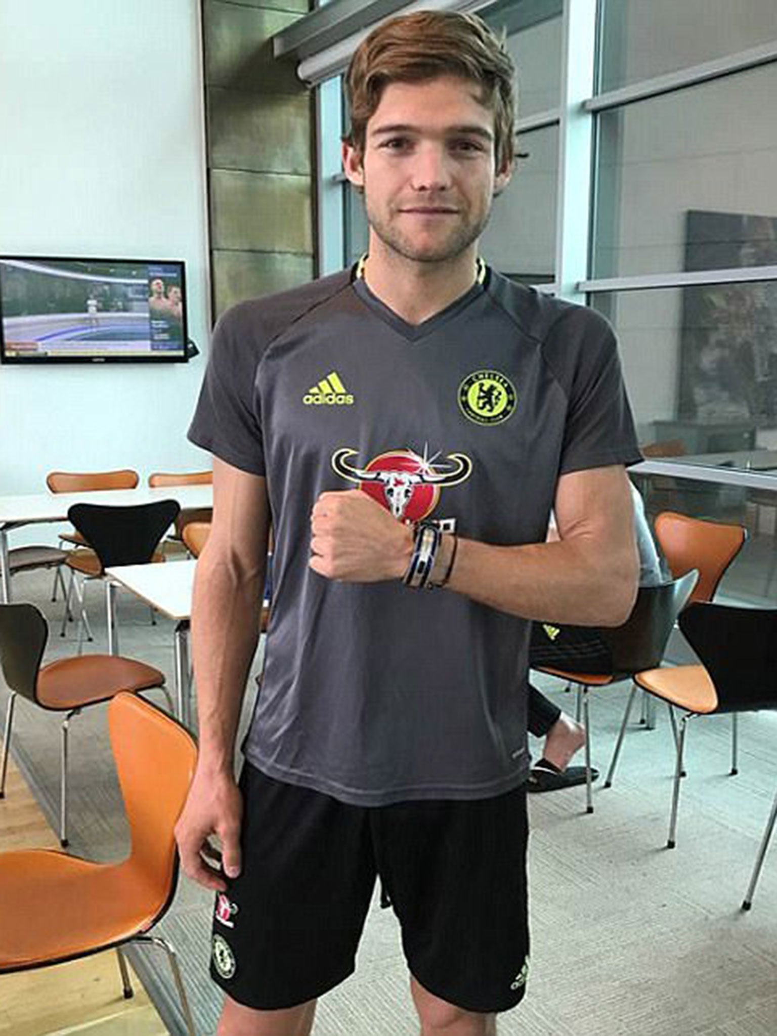 Marcos Alonso models his new supercar key