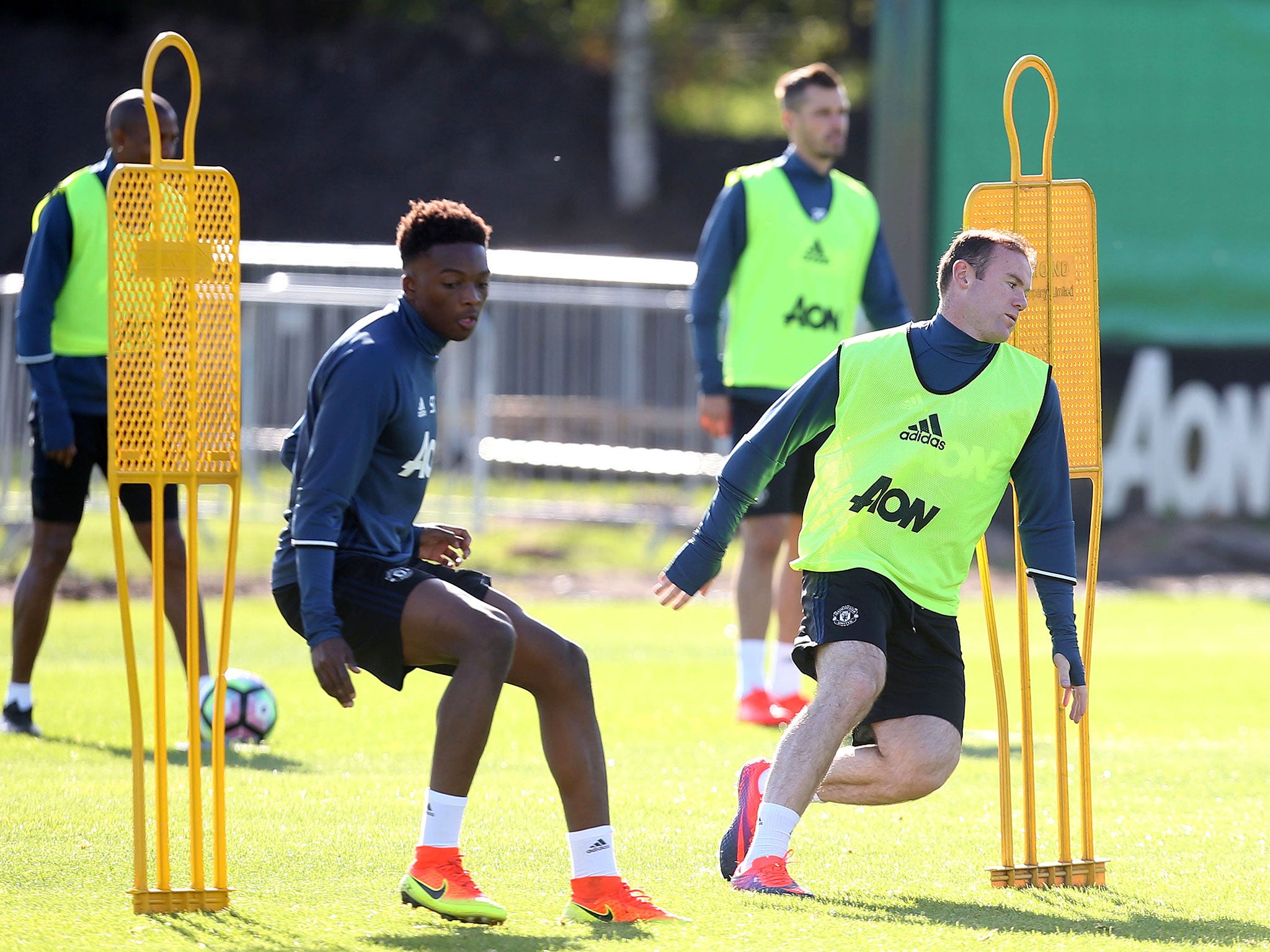 Matty Willock trains with Wayne Rooney