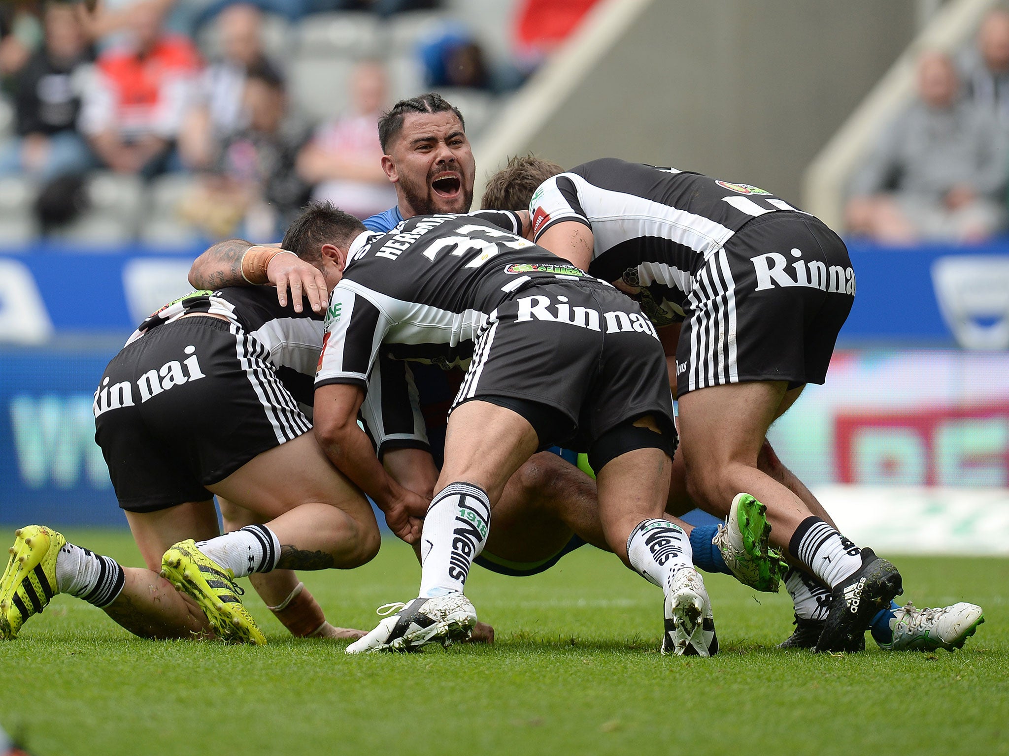 David Fifita is brought down by the Widnes defence