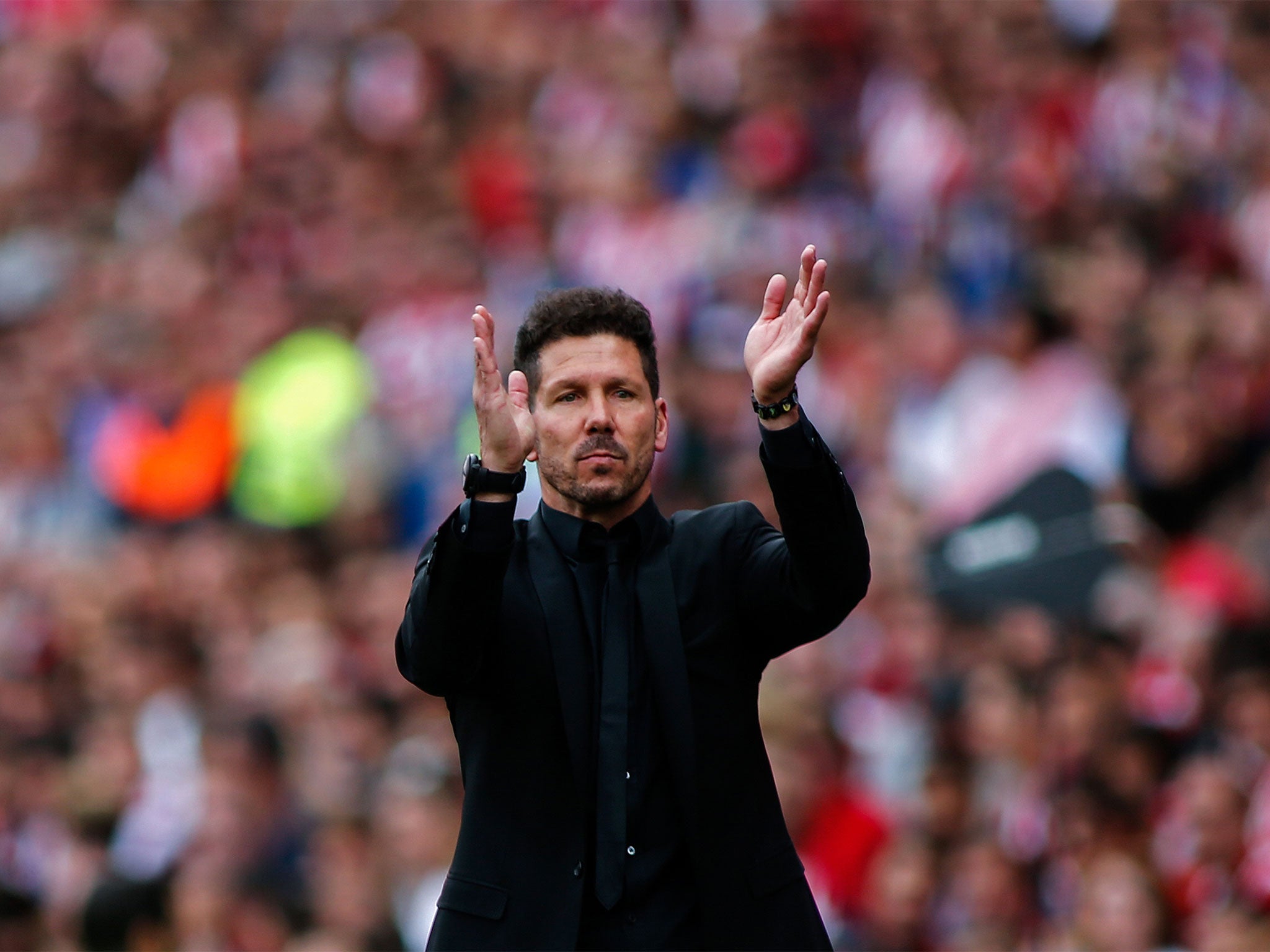 Diego Simeone celebrates Atletico's final-day win over Athletic Club