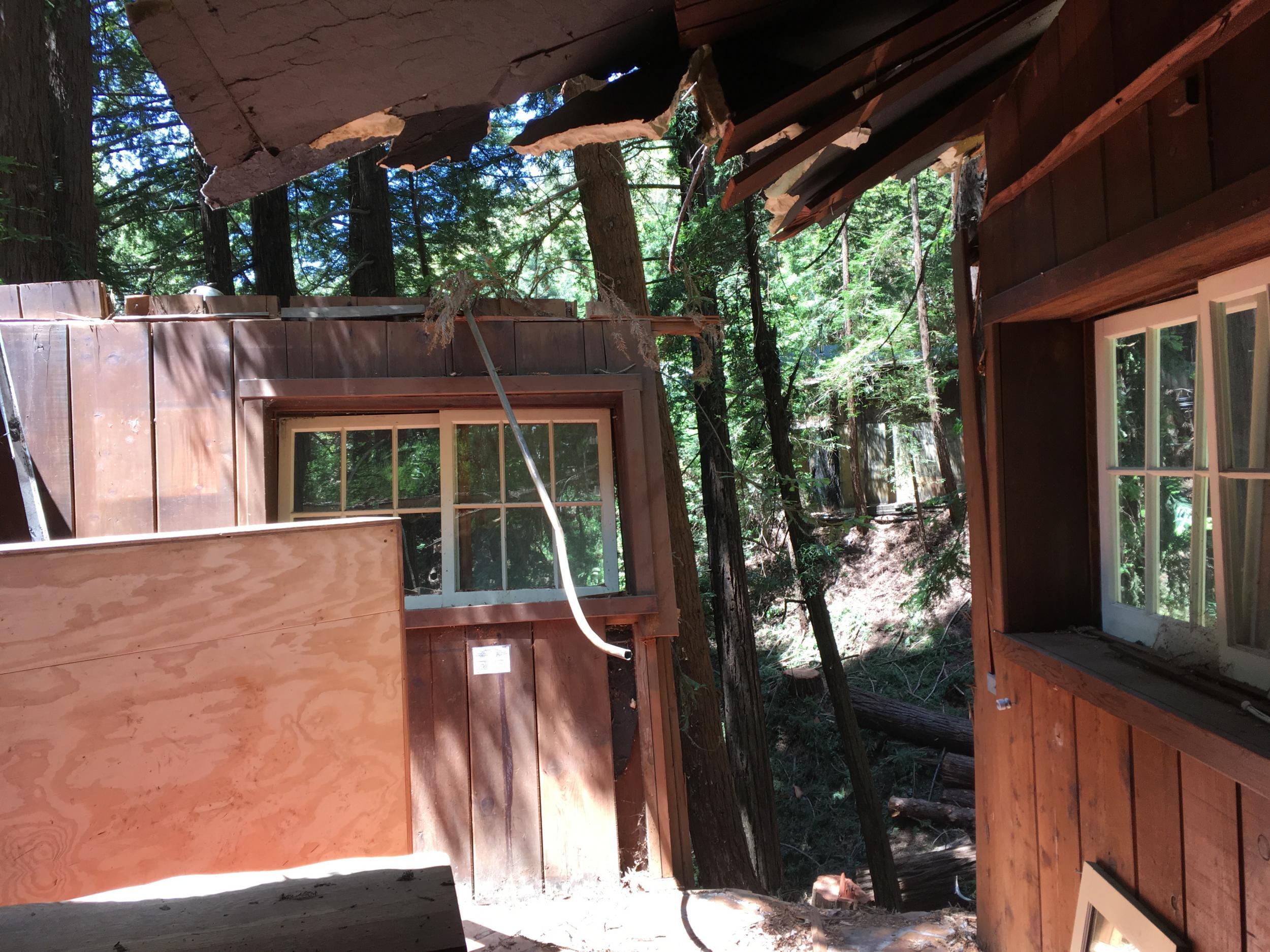 A destroyed cabin at Deetjen's, after being hit by a landslide