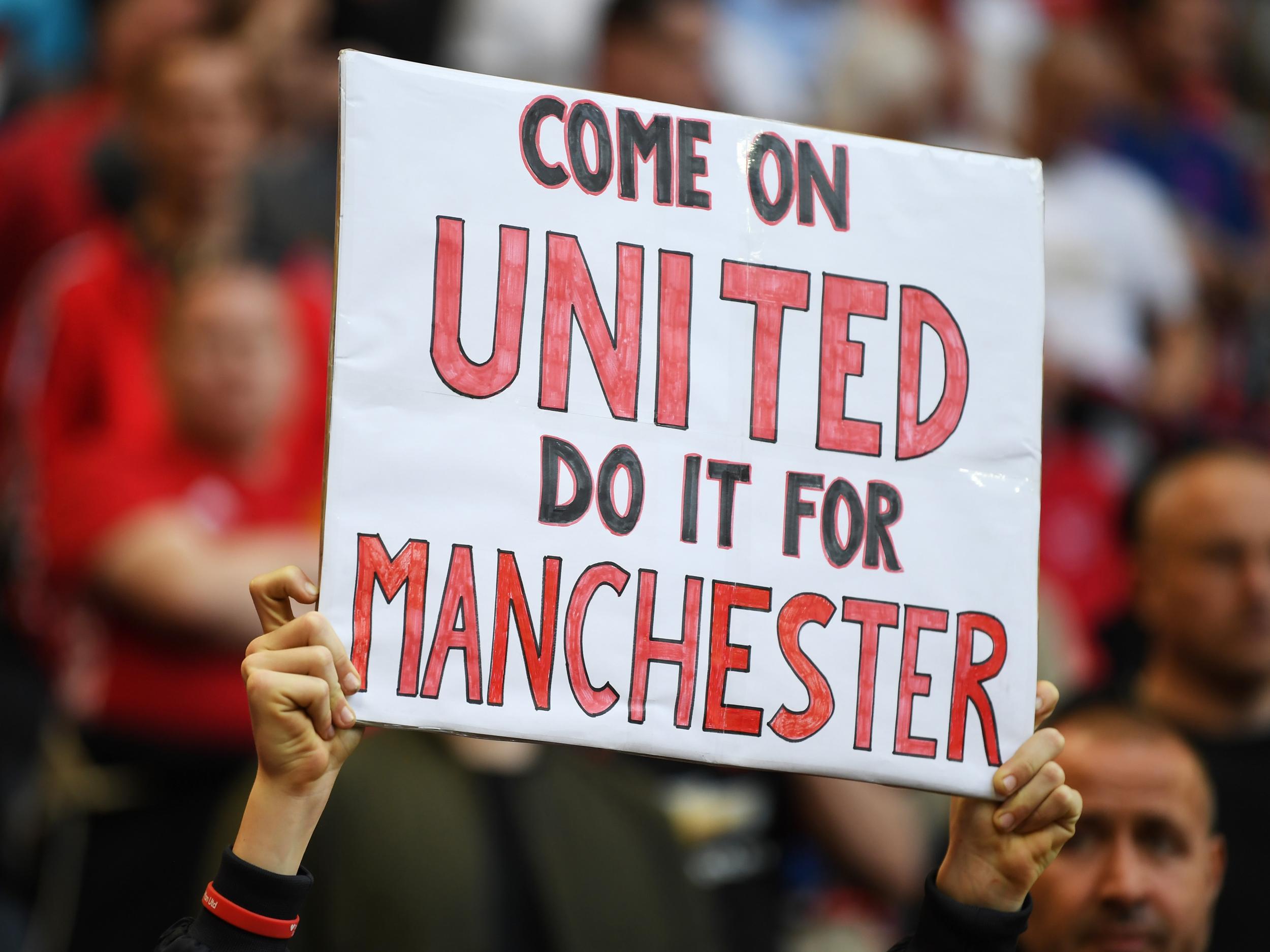 A United supporter held up this sign ahead of kick-off