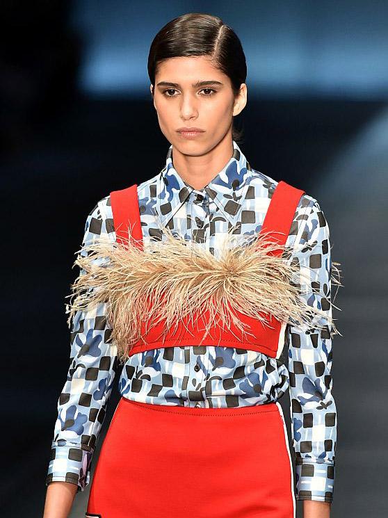 At Prada bra tops were ingeniously worn over shirts