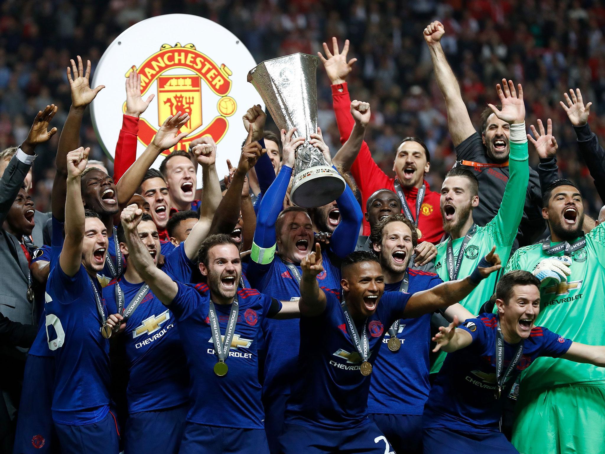 Wayne Rooney lifted the trophy on what is likely his last game for Manchester United