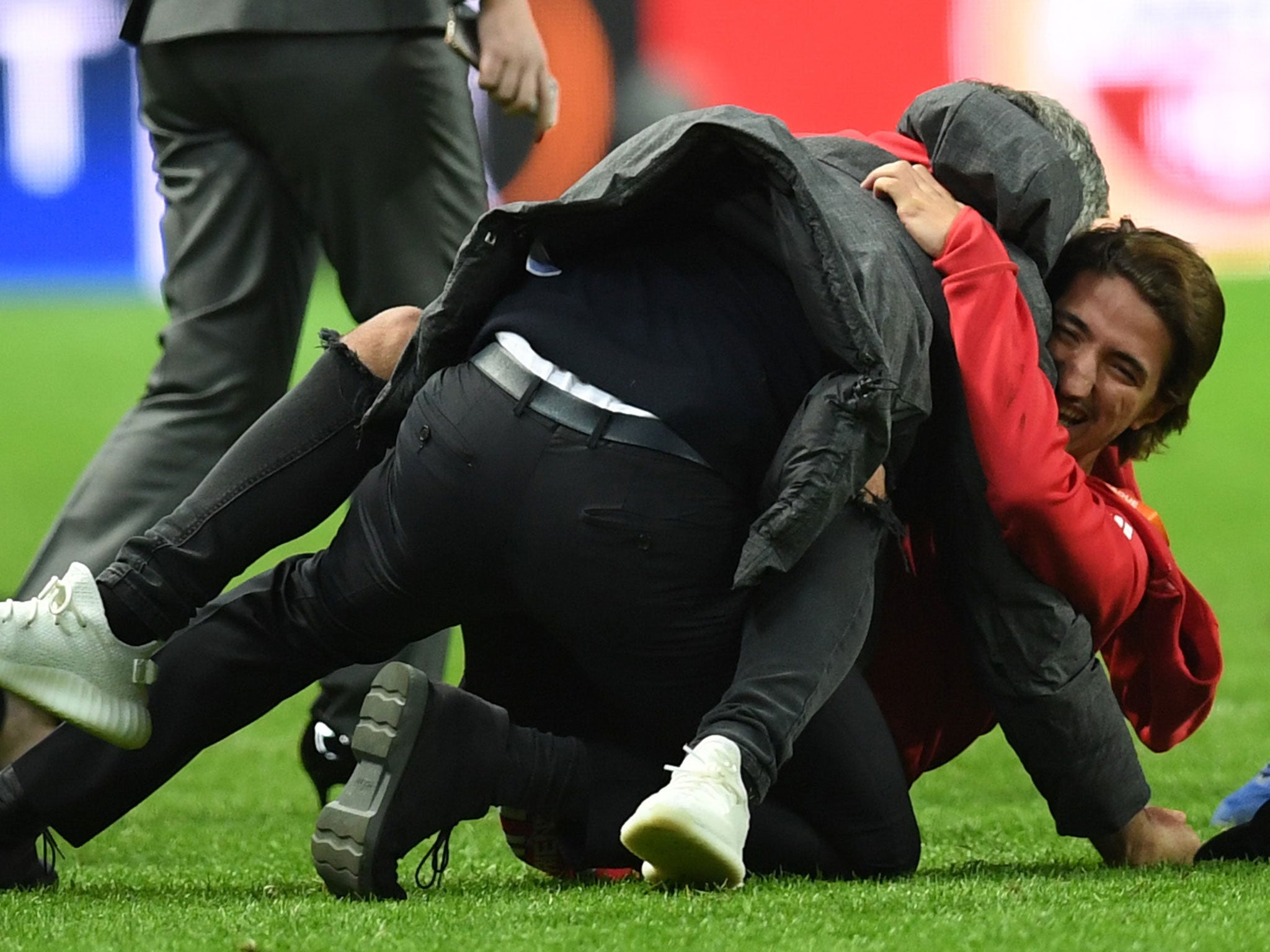 Jose Mourinho is embraced by his son, Jose, after United's victory