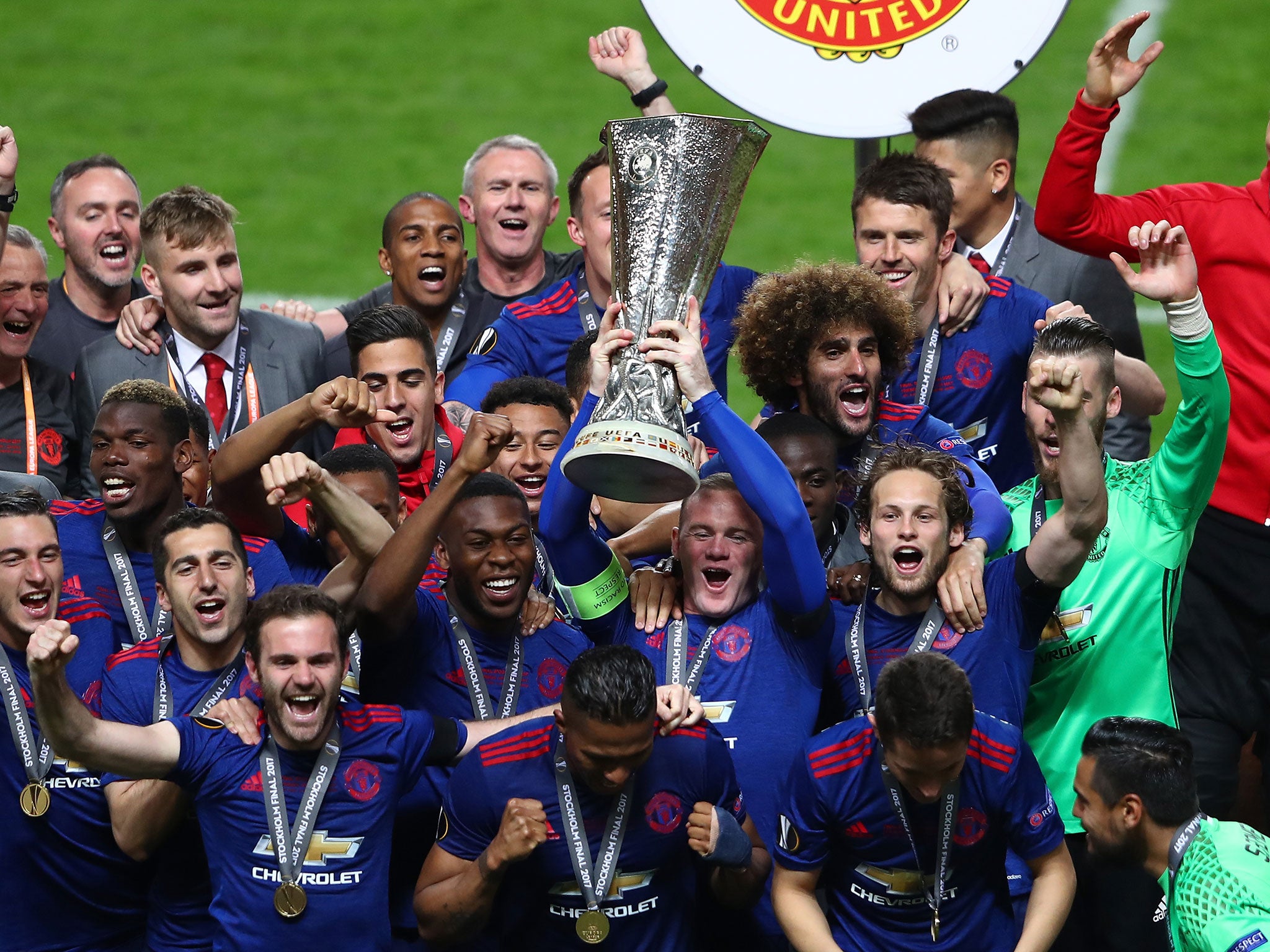 Roone lifted the Europa League trophy after what could have been his final United game