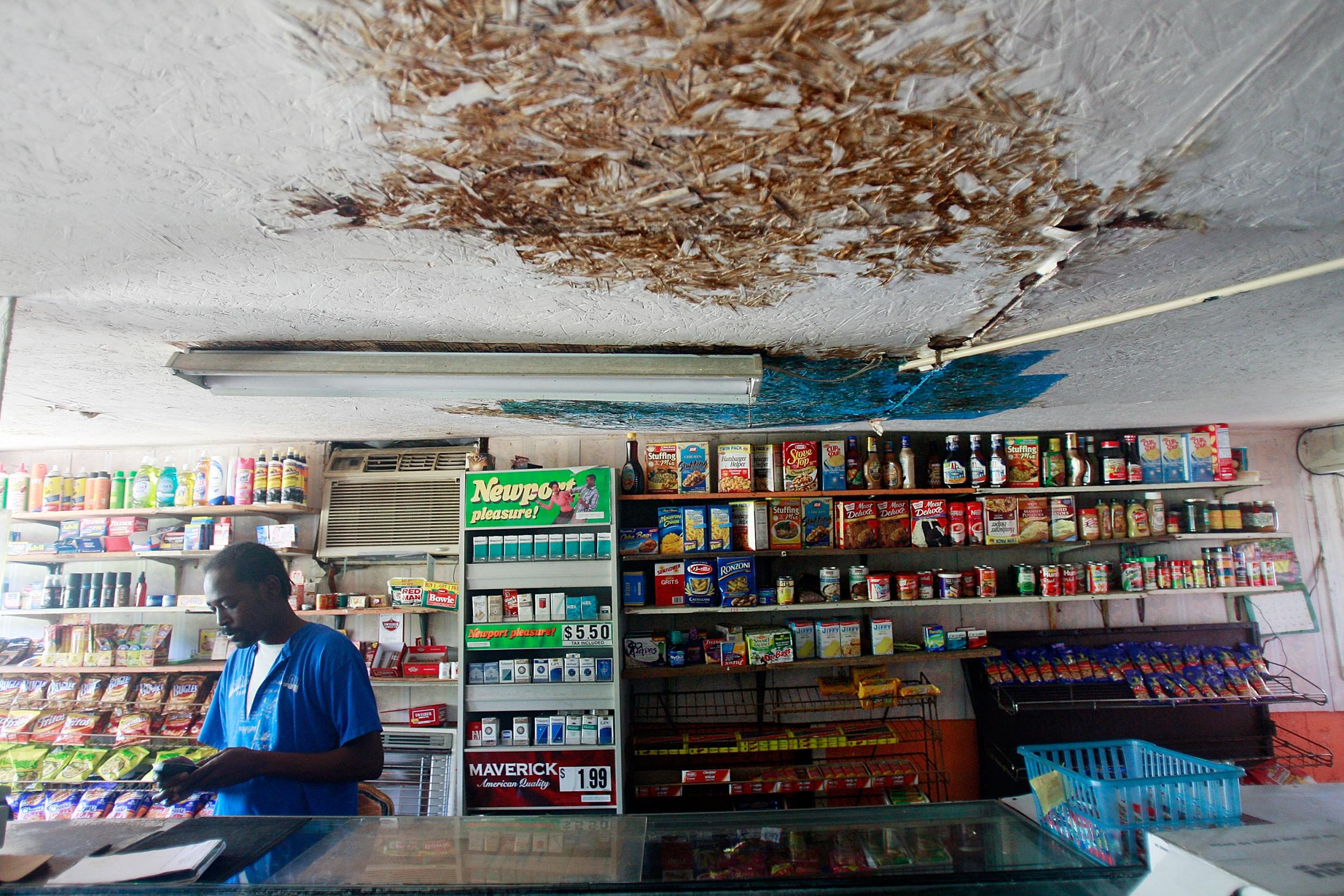 A worker at a store in 2009 in Glendora, Mississippi, a highly impoverished town within the Delta Regional Authority's purview