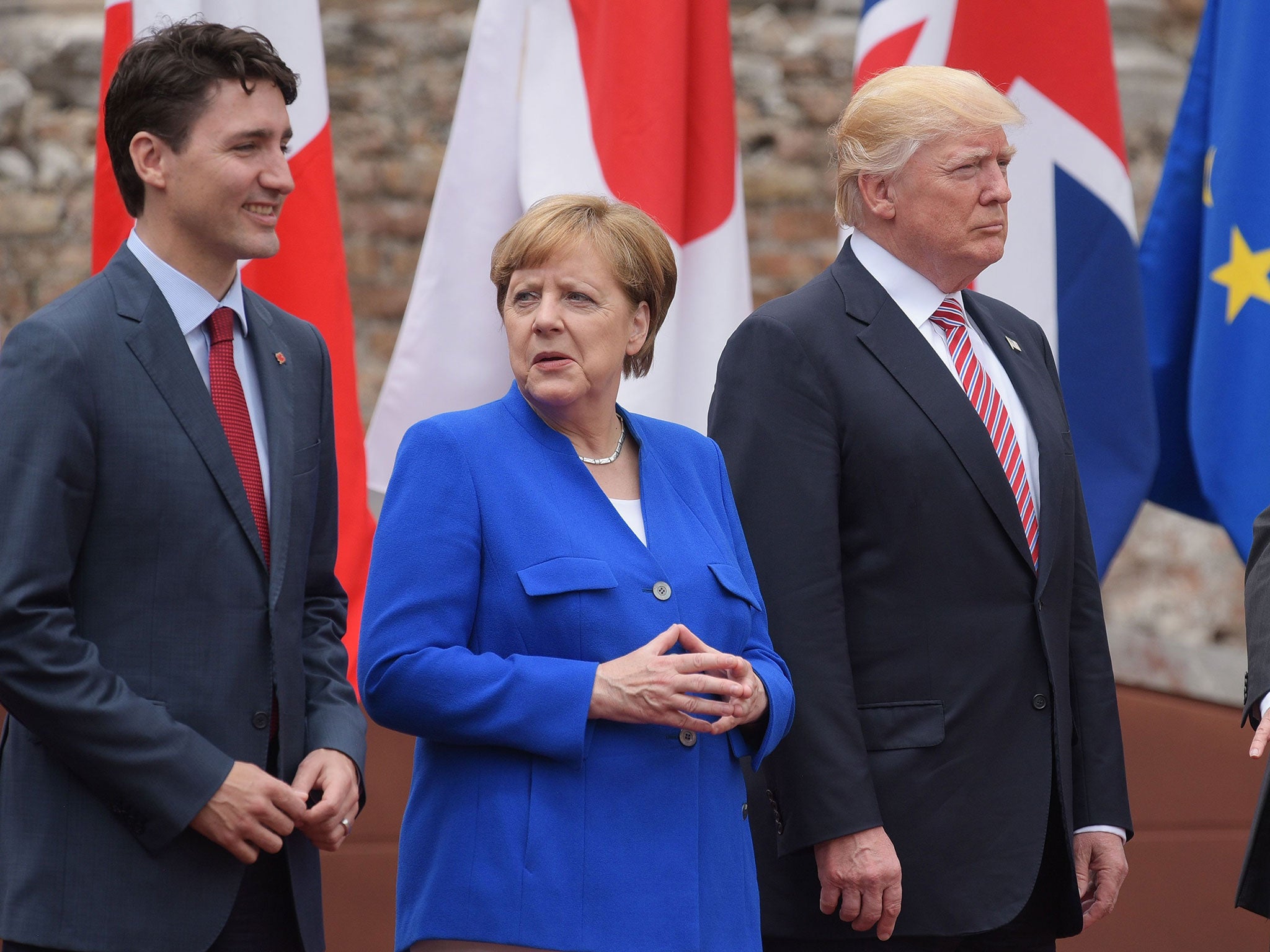 Canada’s Prime Minister Justin Trudeau, Germany’s Chancellor Angela Merkel and Donald Trump during the G7 Summit in Taormina