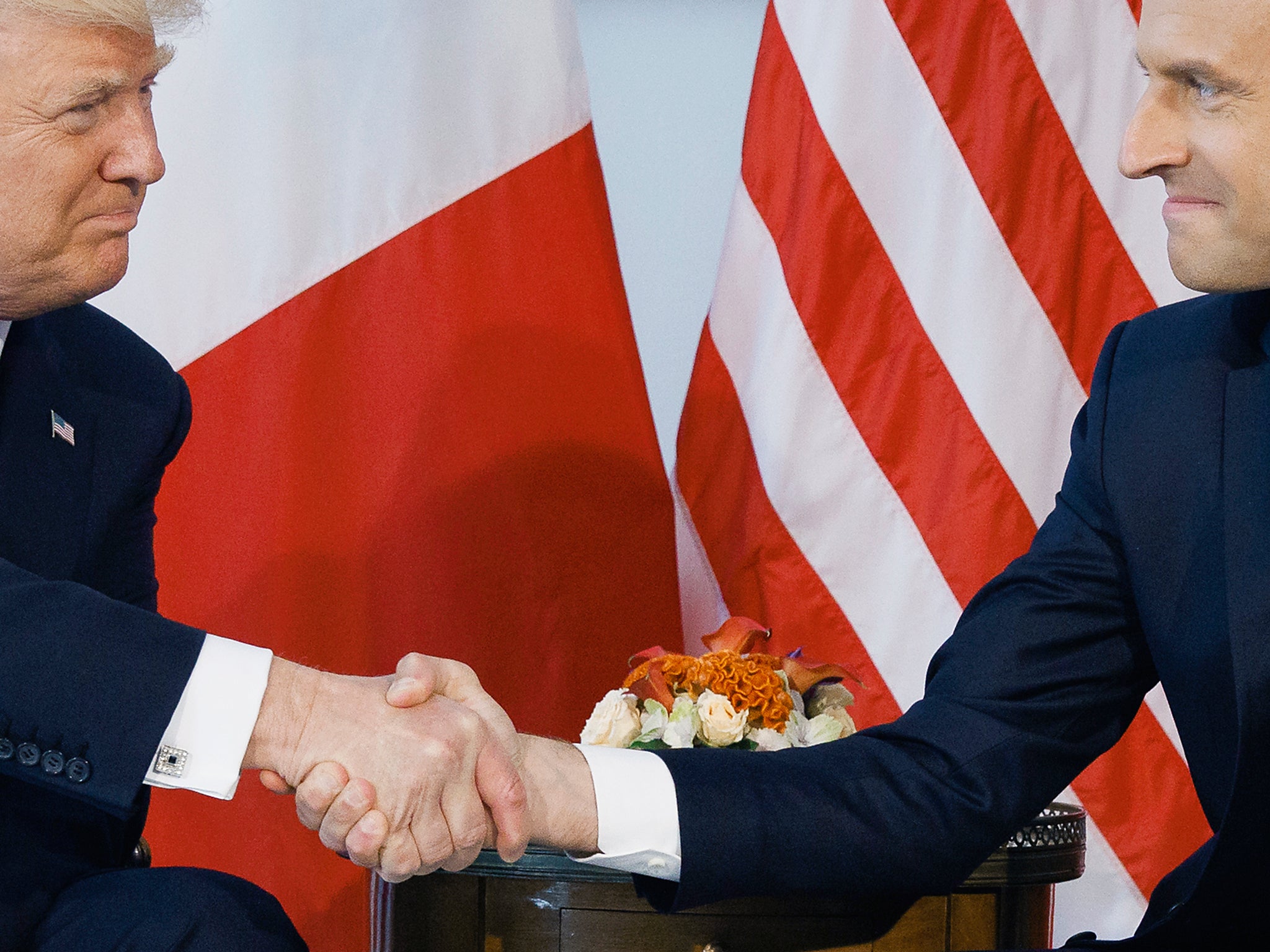 President Donald Trump shakes hands with French President Emmanuel Macron