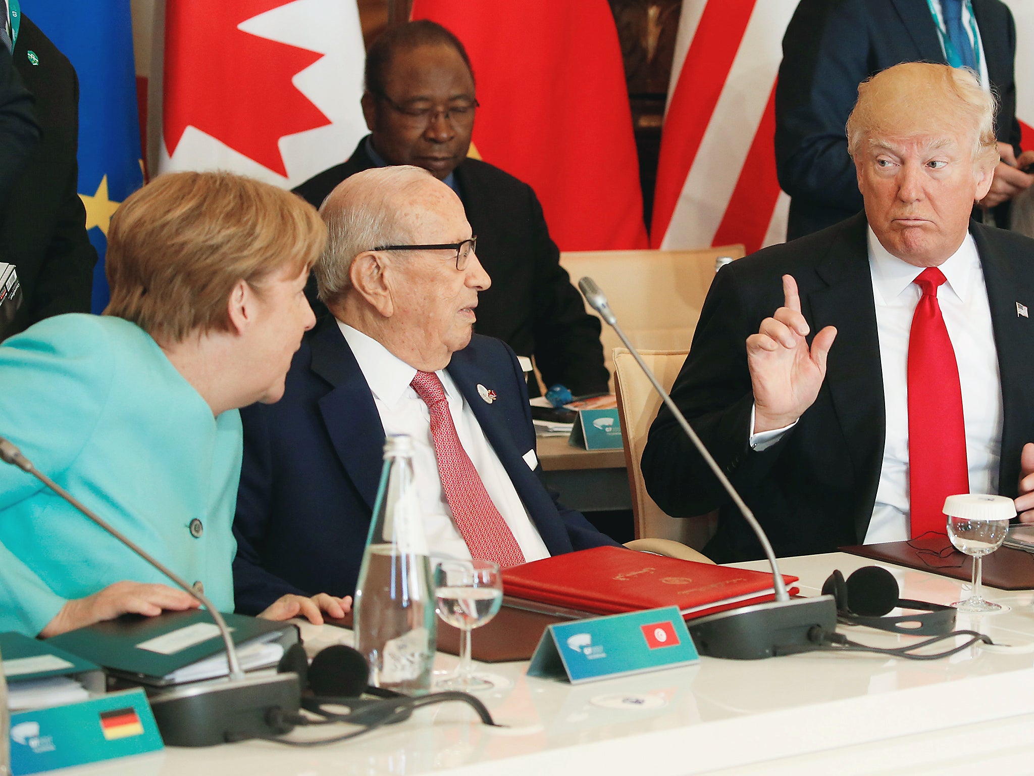 Race against time: Ms Merkel failed to elicit cooperation from Mr Trump on the 2015 Paris climate deal