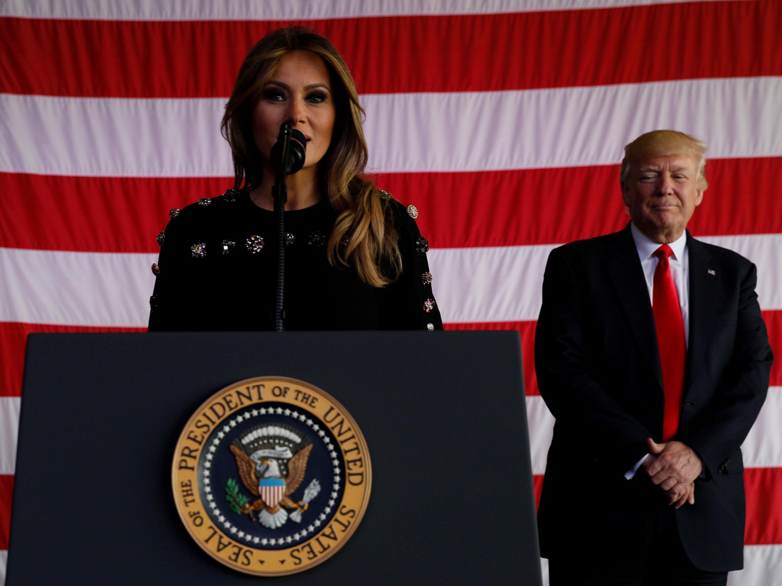 US First Lady Melania Trump introduces her husband President Donald Trump as he rallies with service members at Sigonella Air Force Base at Naval Air Station in Italy