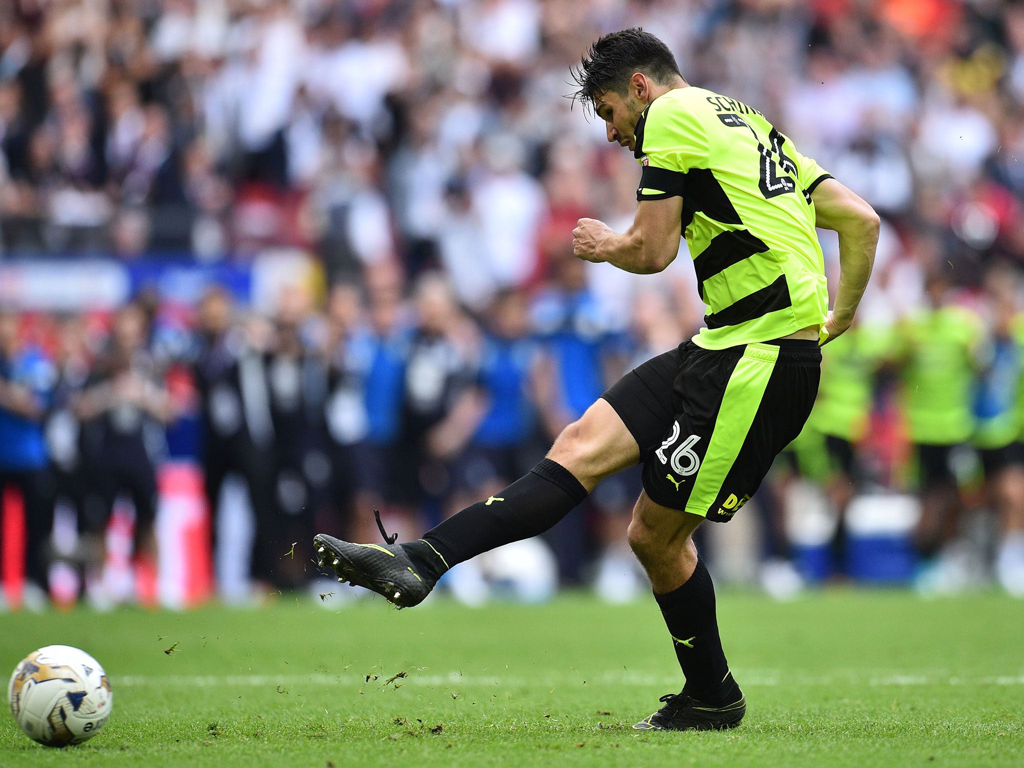 Christopher Schindler scores the winning penalty for Huddersfield