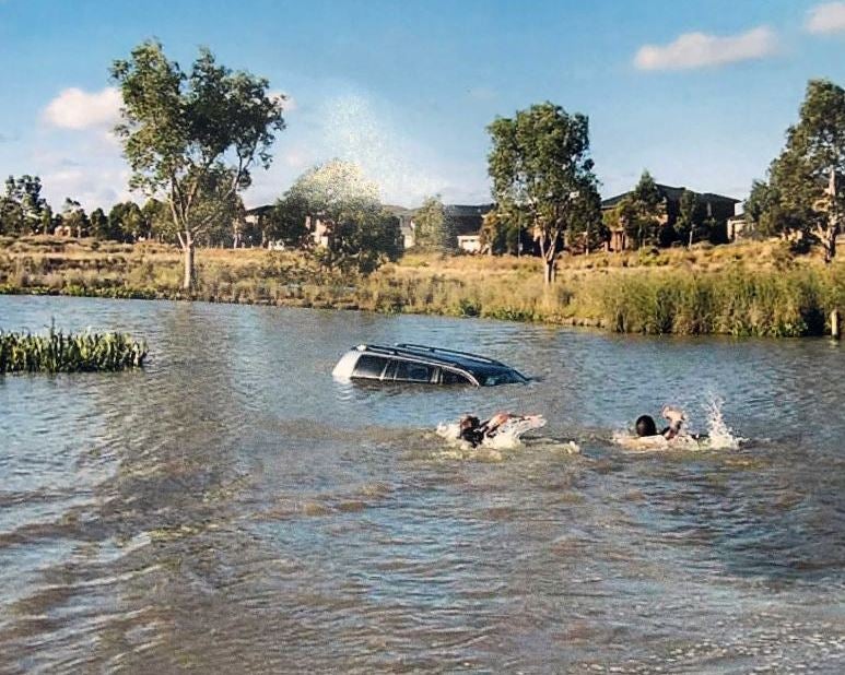 Rescuers tried to save the children trapped in the car after it was driven into a lake in Wyndham Vale