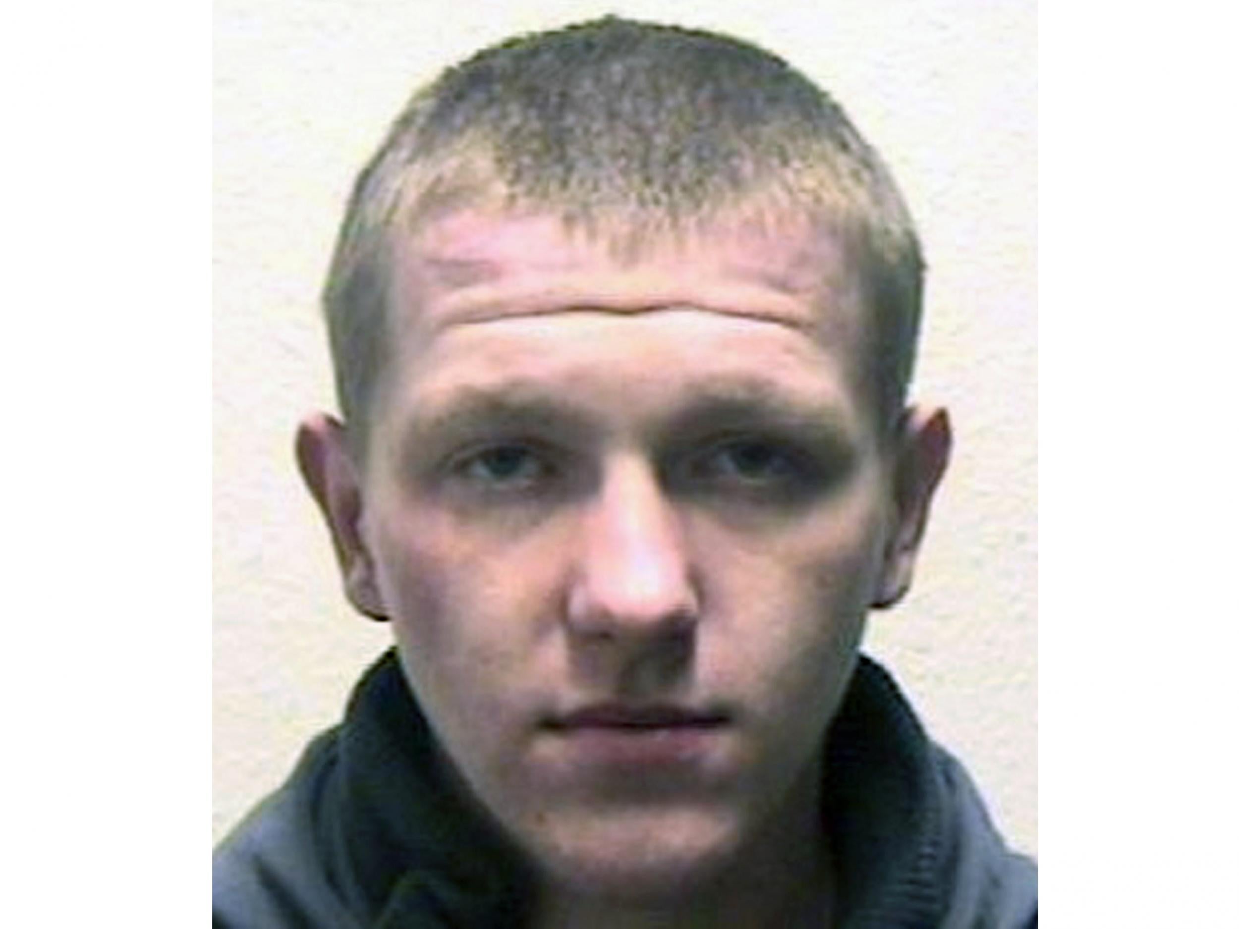 Handout photo issued by Wiltshire Police of Michal Kisier, 30, a prisoner who has escaped from a hospital and is believed to be armed with a razor blade