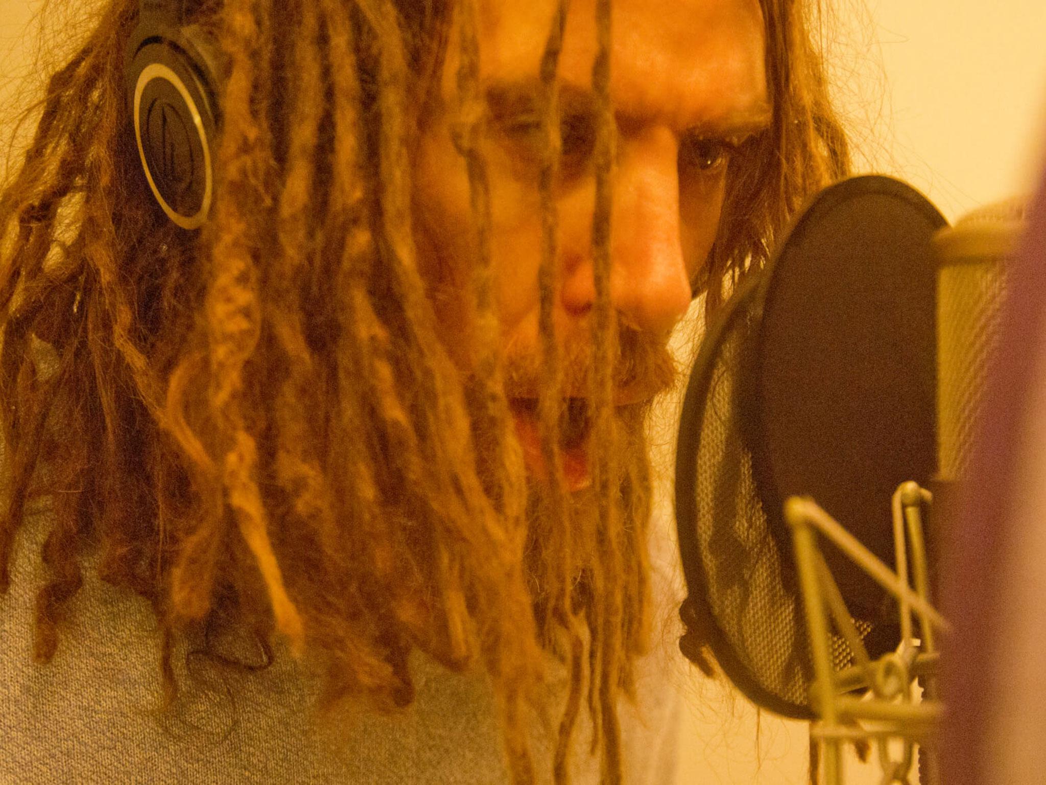 Mikee W Goodman laying down vocals in the studio for SikTh