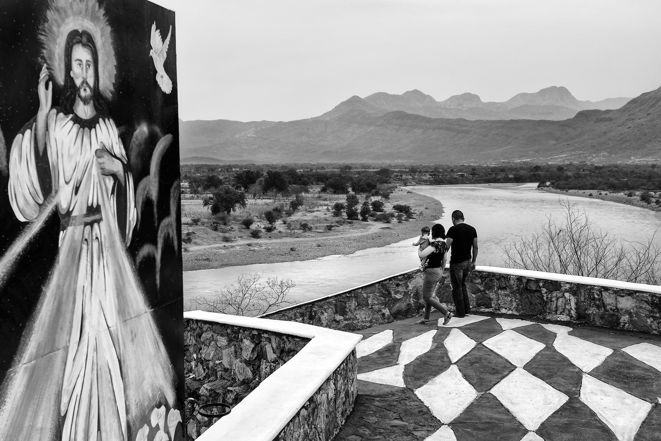 A family walks out to a vista point in Morelita