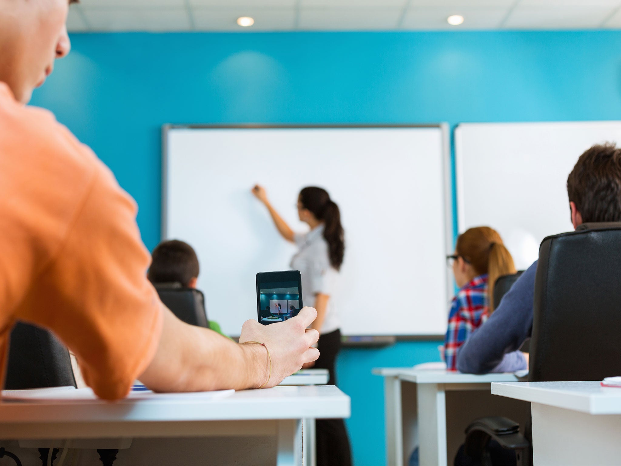 Nearly a third of teachers have suffered online harassment in the past year, according to a teaching union poll