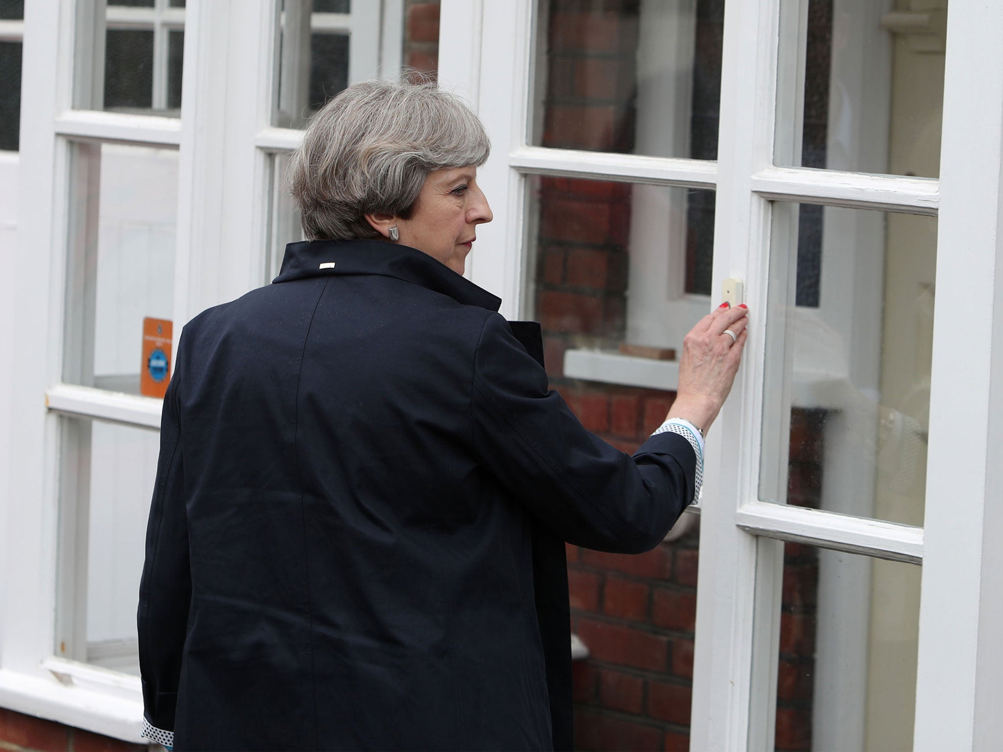 Theresa May out campaigning in Richmond, is visibly ill at ease with voters