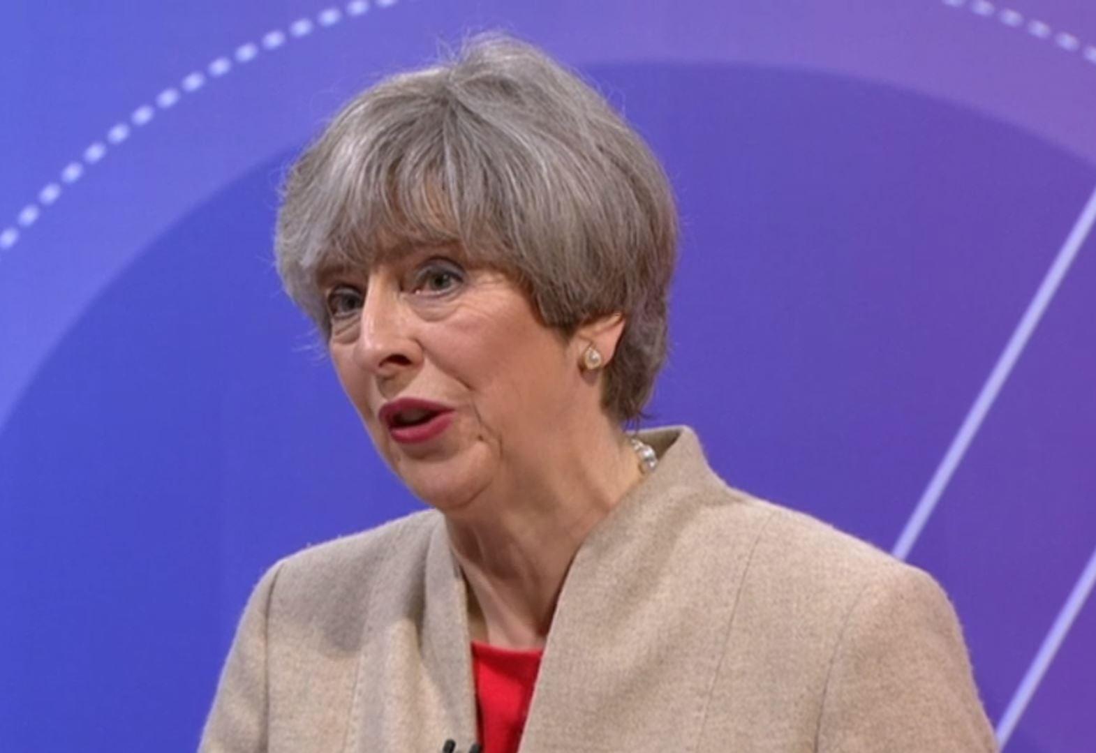 Theresa May answers a question on schools funding