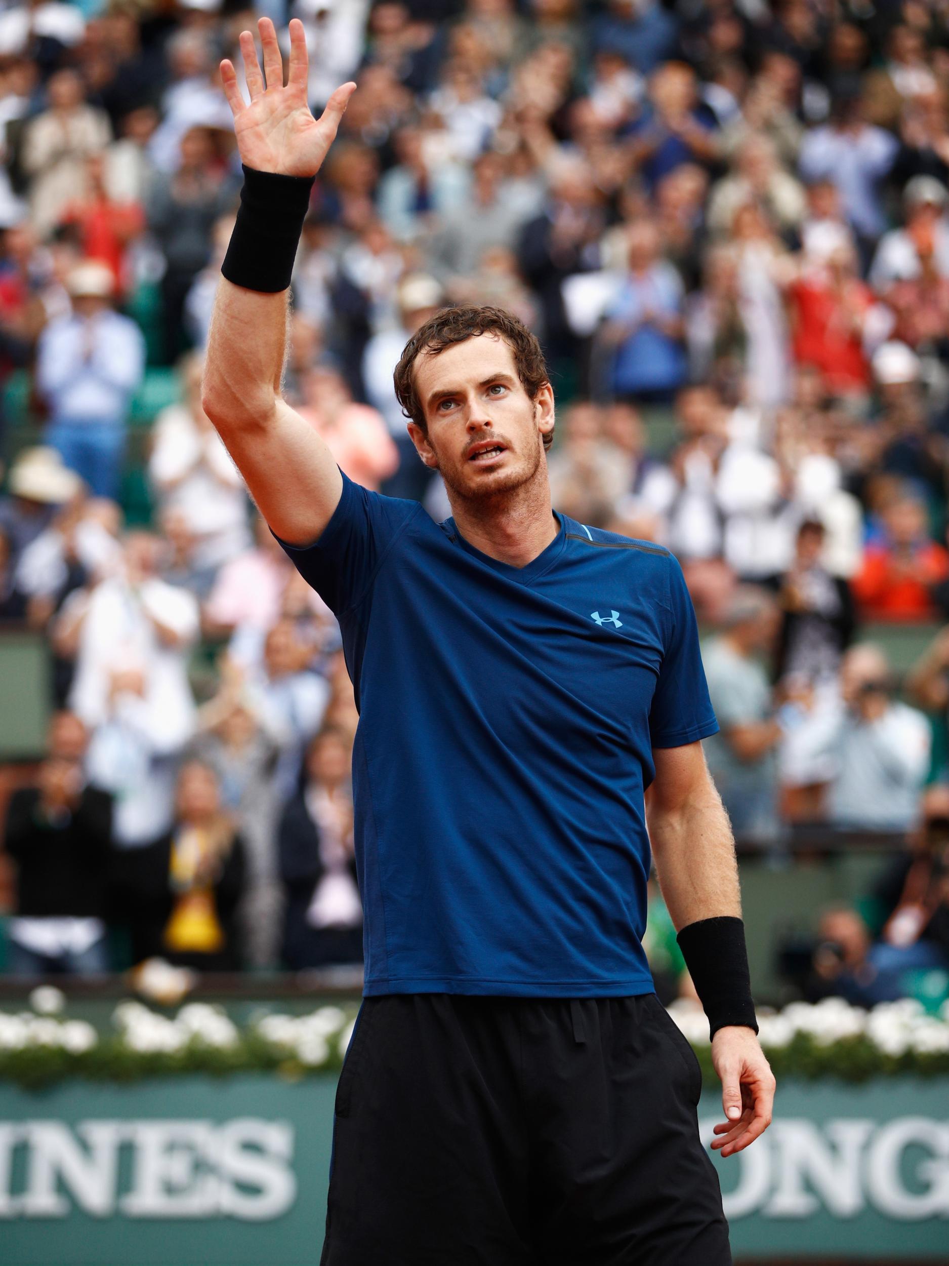 Murray celebrates his win (after a quick change of shirts)