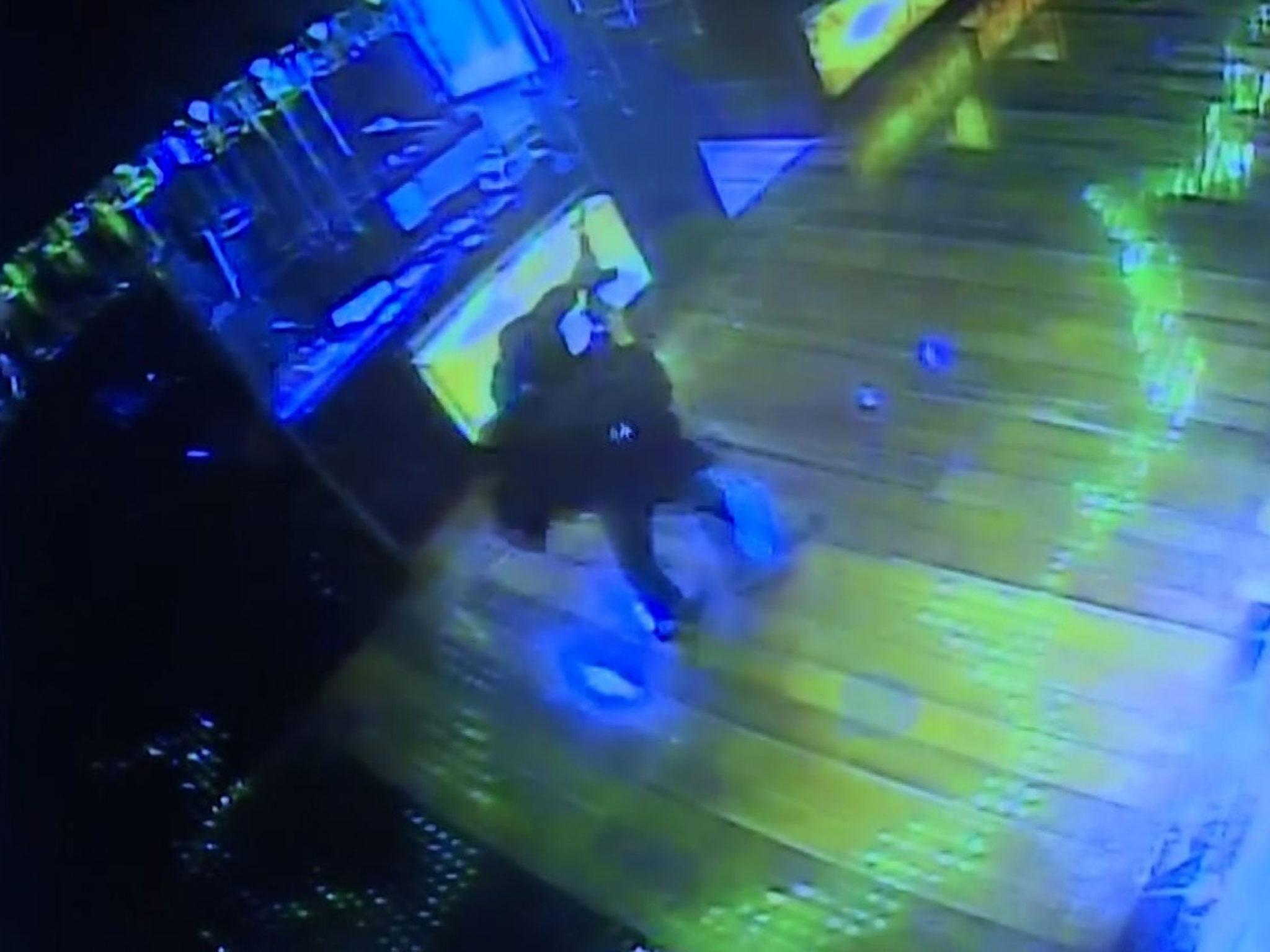 A CCTV image apparently showing the gunman opening fire inside the casino