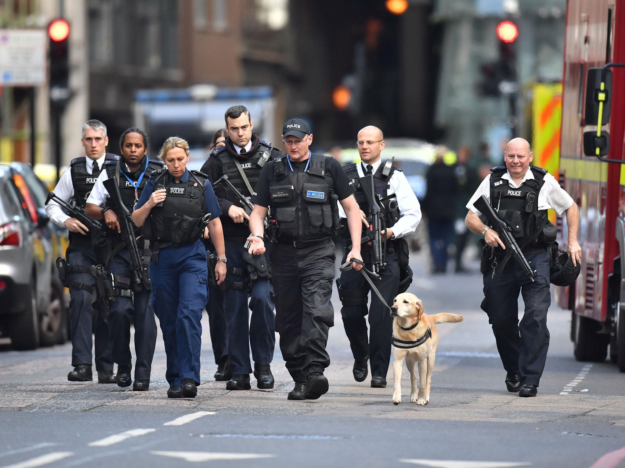 Armed police on St Thomas Street, London, near the scene of last night's terrorist attack at Borough Market